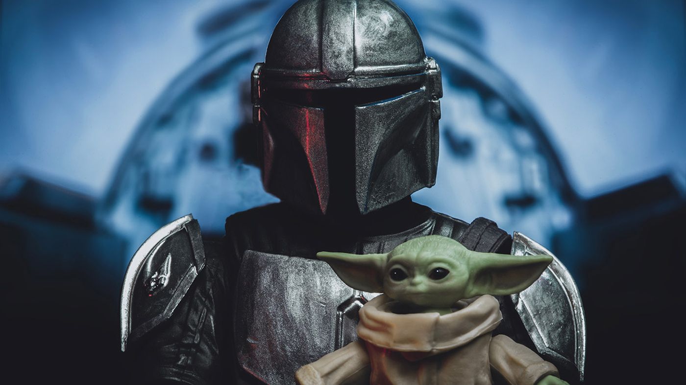 scene from Disney Plus Star Wars The Mandalorian with Din Djarin and Grogu in the cockpit of a Naboo N1 starfighter - Hasbro action figure