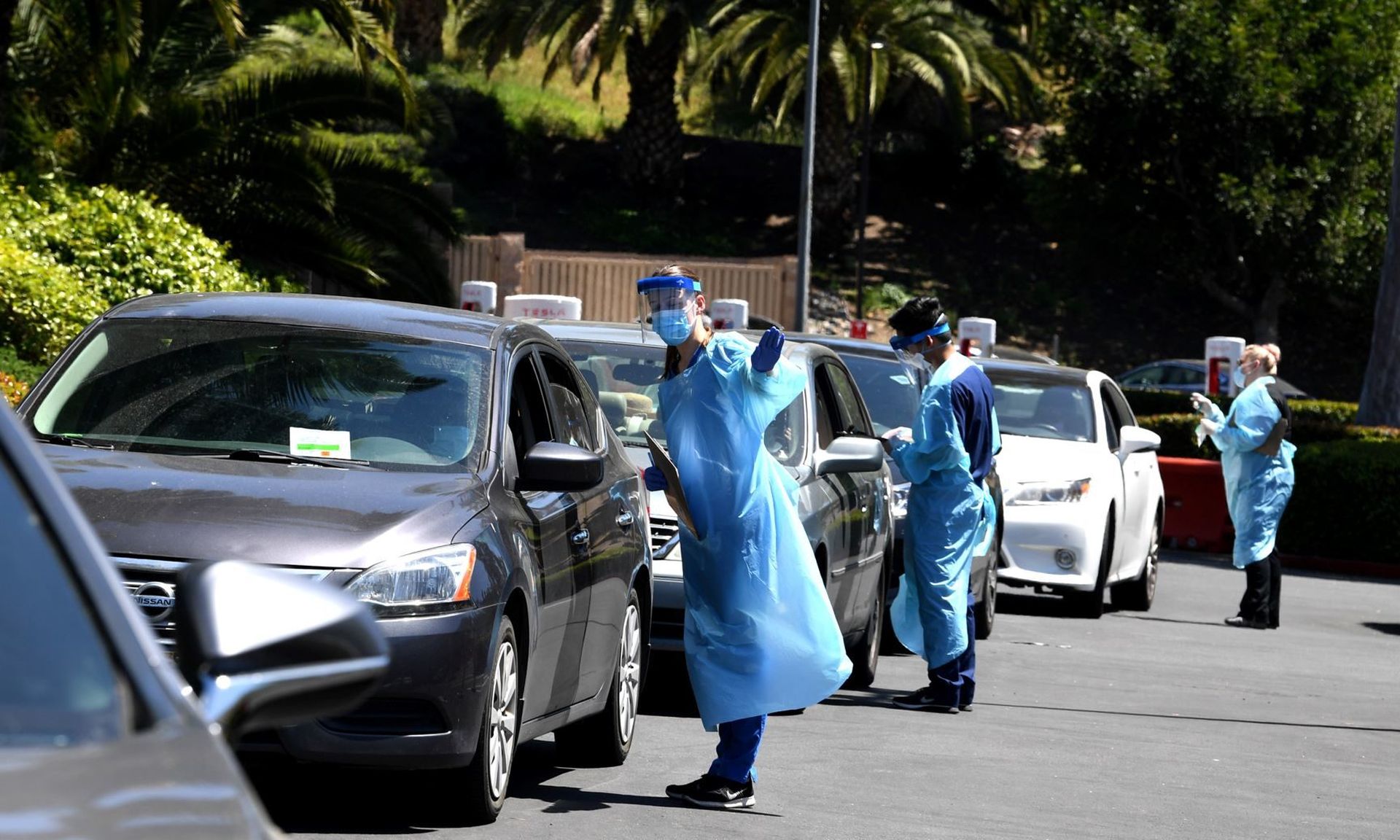COVID-19 testing administered from a car at Mend Urgent Care in the Culver City neighborhood of Los Angeles. An expired certificate contributed to an under count of COVID-19 cases in California. (Photo by Kevin Winter/Getty Images)