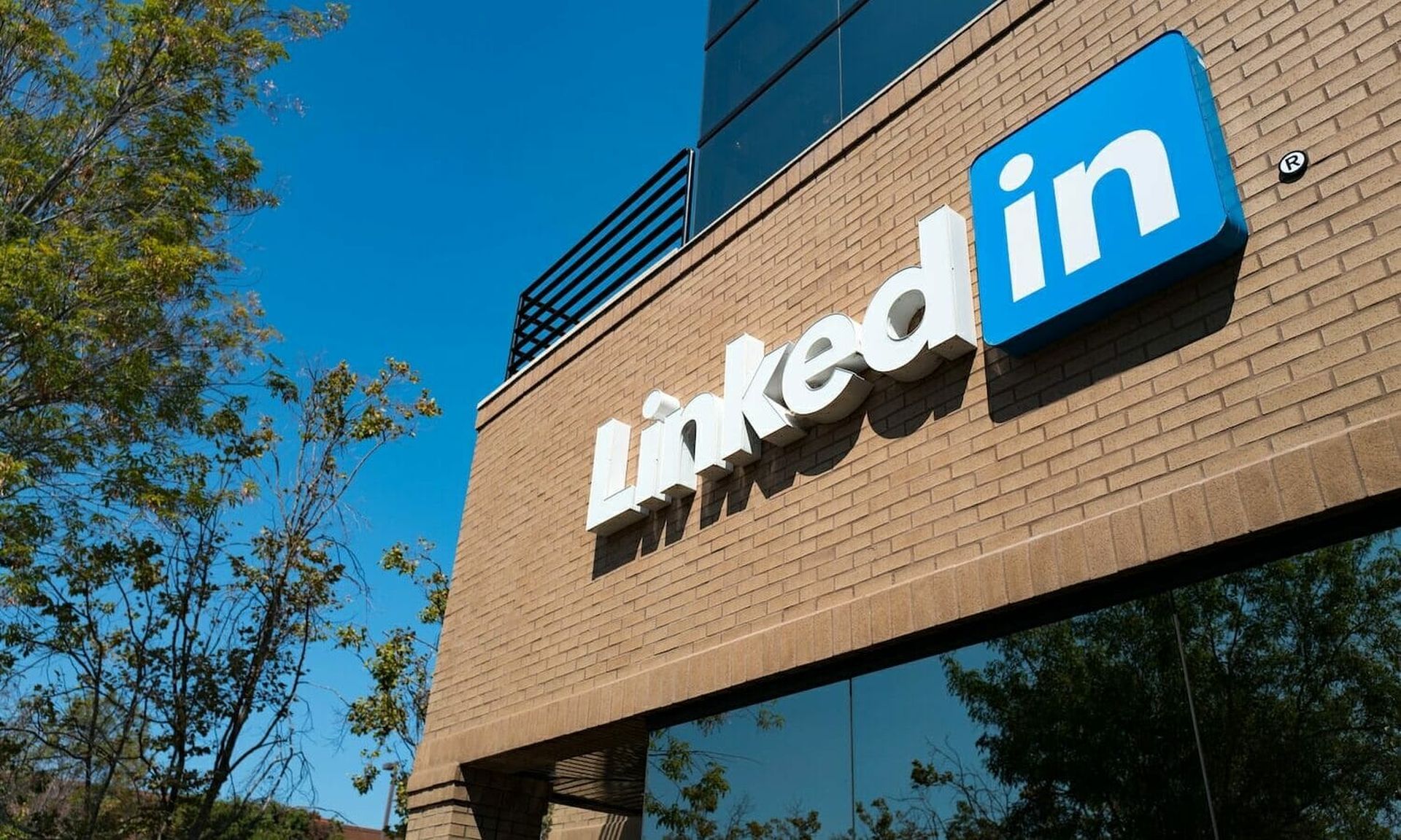 Close up of signage with logo at the headquarters of professional social networking company LinkedIn, in the Silicon Valley town of Mountain View, California, August 24, 2016. (Smith Collection/Gado/Getty Images).