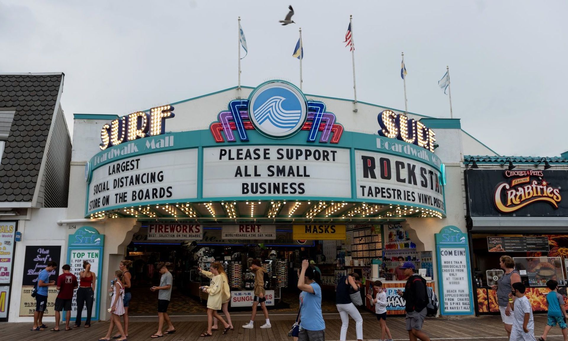 A ‘Please Support Small Business’ sign is seen on the marquee at the Surf mall. Small- and medium-sized businesses (SMBs) face unrelenting attacks by  Ransomware-as-a-Service. (Photo by Alexi Rosenfeld/Getty Images)