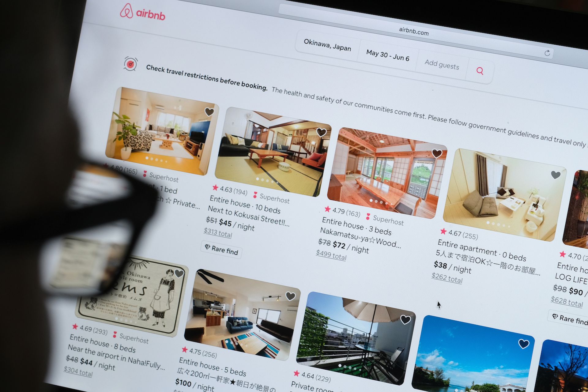 A man looks at the website of Airbnb in Katwijk, Netherlands. Cloudflare introduced an analytics platform similar to Google&#8217;s but which does  not track visitors to websites. (Photo by Yuriko Nakao/Getty Images)