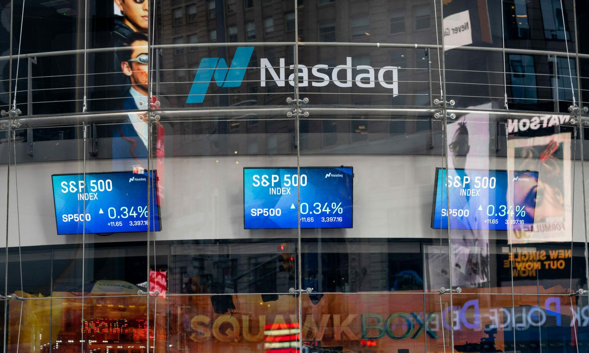 S&amp;P 500 trading screens are displayed at the Nasdaq building in Times Square August 21, 2020 in New York City. Organizations looking to grow might want to use cybersecurity as a business accelerator. Photo by Alexi Rosenfeld/Getty Images)