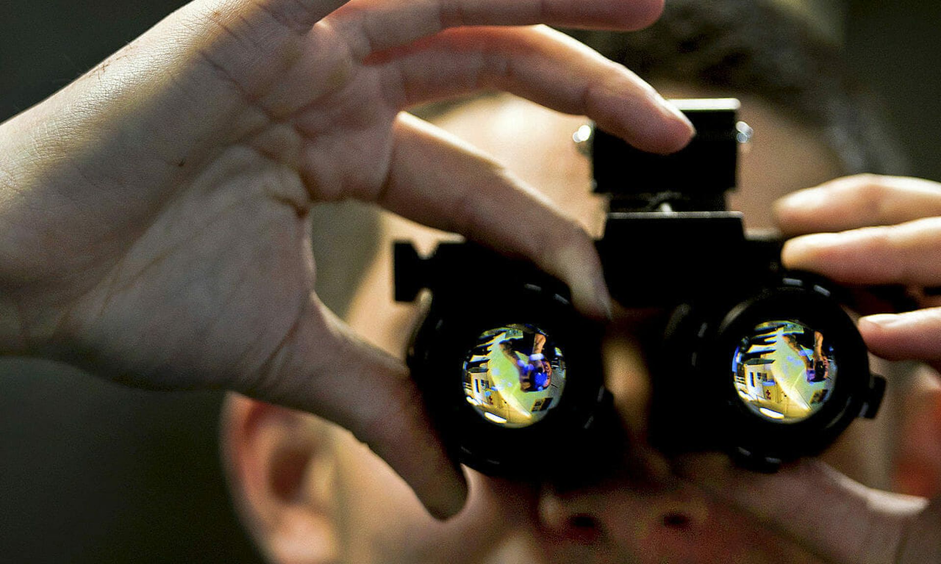 U.S. Navy Seaman Garrick Hague adjusts a set of night-vision goggles inside an intermediate maintenance shop aboard the aircraft carrier USS Carl Vinson in the Pacific Ocean on Jan. 6, 2011. Lucidum, a startup founded by two former Splunk executives, delivers technology that essentially acts like night vision for your IT assets . (U.S. Navy)