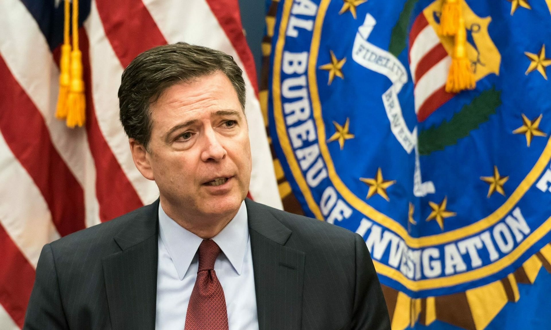 Former FBI Director James Comey speaks about the San Bernardino, Calif. shooter, whose iPhone became a point of contention between the FBI and Apple. Five Eyes essentially renewed a call for tech companies to put backdoors in their products. Photo source: FBI