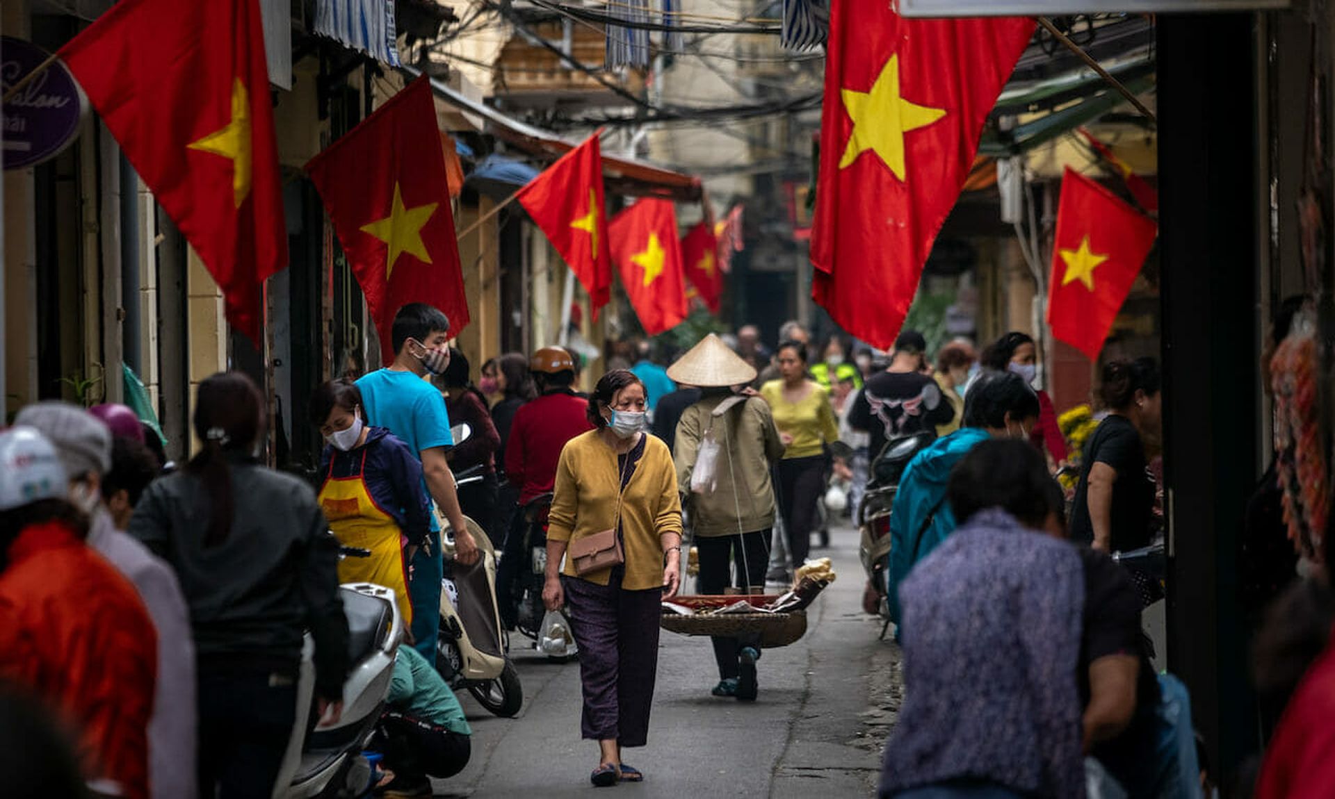 People  in Hanoi, Vietnam in March 2020. Research from ESET showed a supply chain attack in Vietnam in which digital certificates were compromised. (Linh Pham/Getty Images)