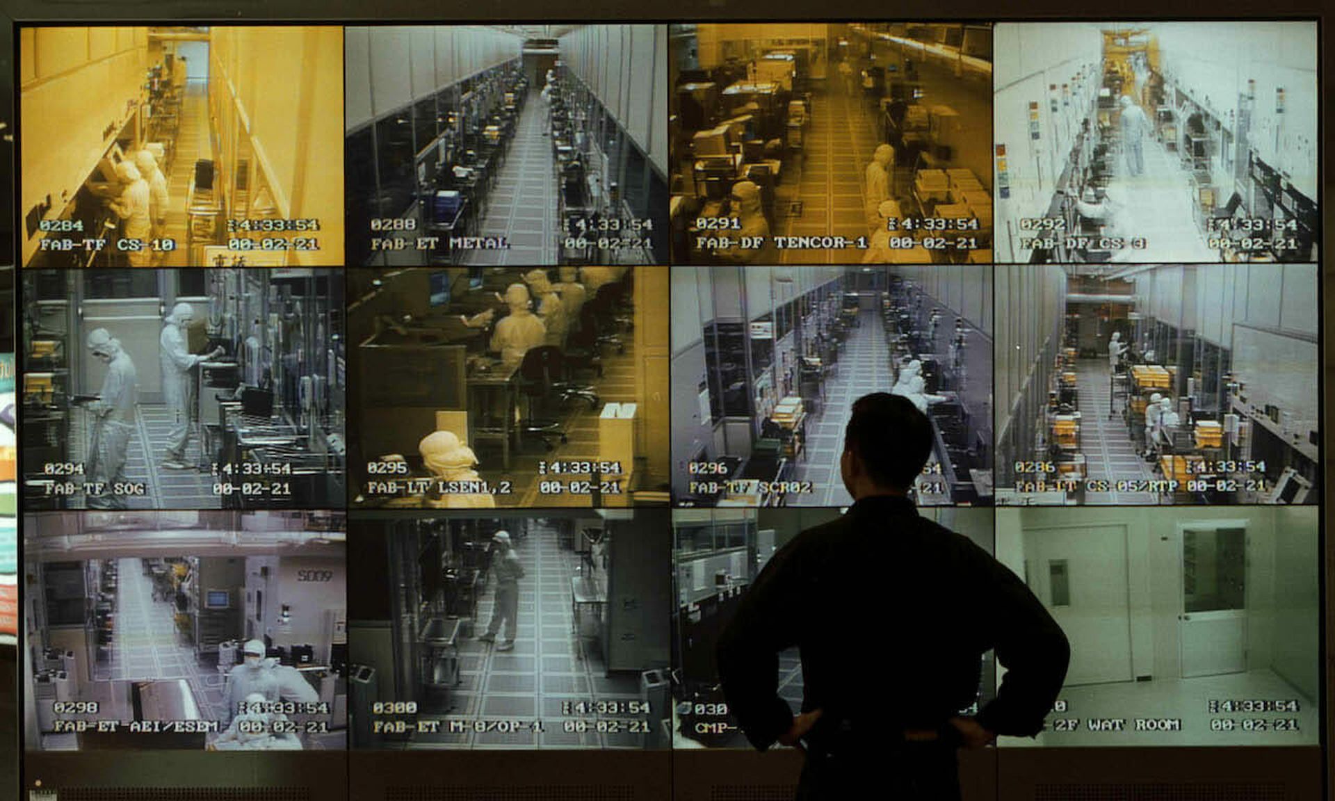 An audit of open source TCP/IP found vulnerabilities that impact chips, boards, microcontrollers and other hardware used in making devices. Here, visitor observes semiconductor manufacturing on a wall of monitors in Taiwan. (David Hartung/Getty Images)