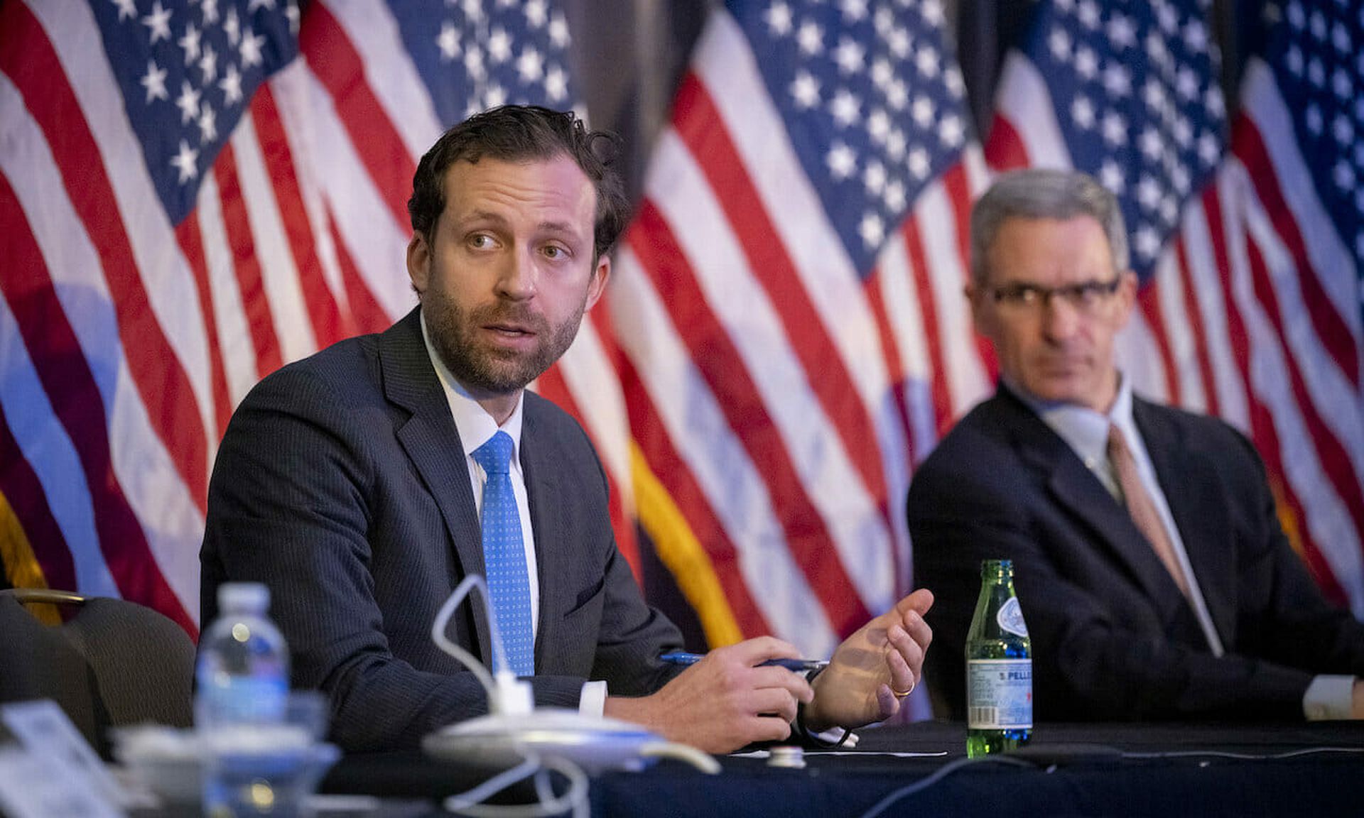 Acting Homeland Security Secretary Chad Wolf participate in a roundtable discussion. Some cyber experts take notion with claims that agencies and companies were too consumed with election security to recognize supply chain vulnerabilities. (Homeland Security Department)