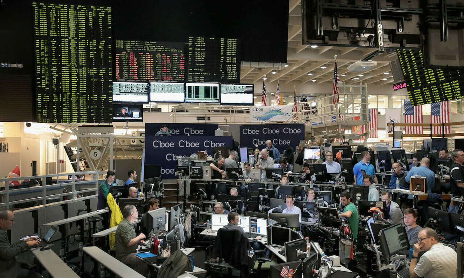 Traders trade VIX contracts at the Cboe Global Markets exchange. The exchange was the first in the Unites States to begin trading Bitcoin futures. (Scott Olson/Getty Images)