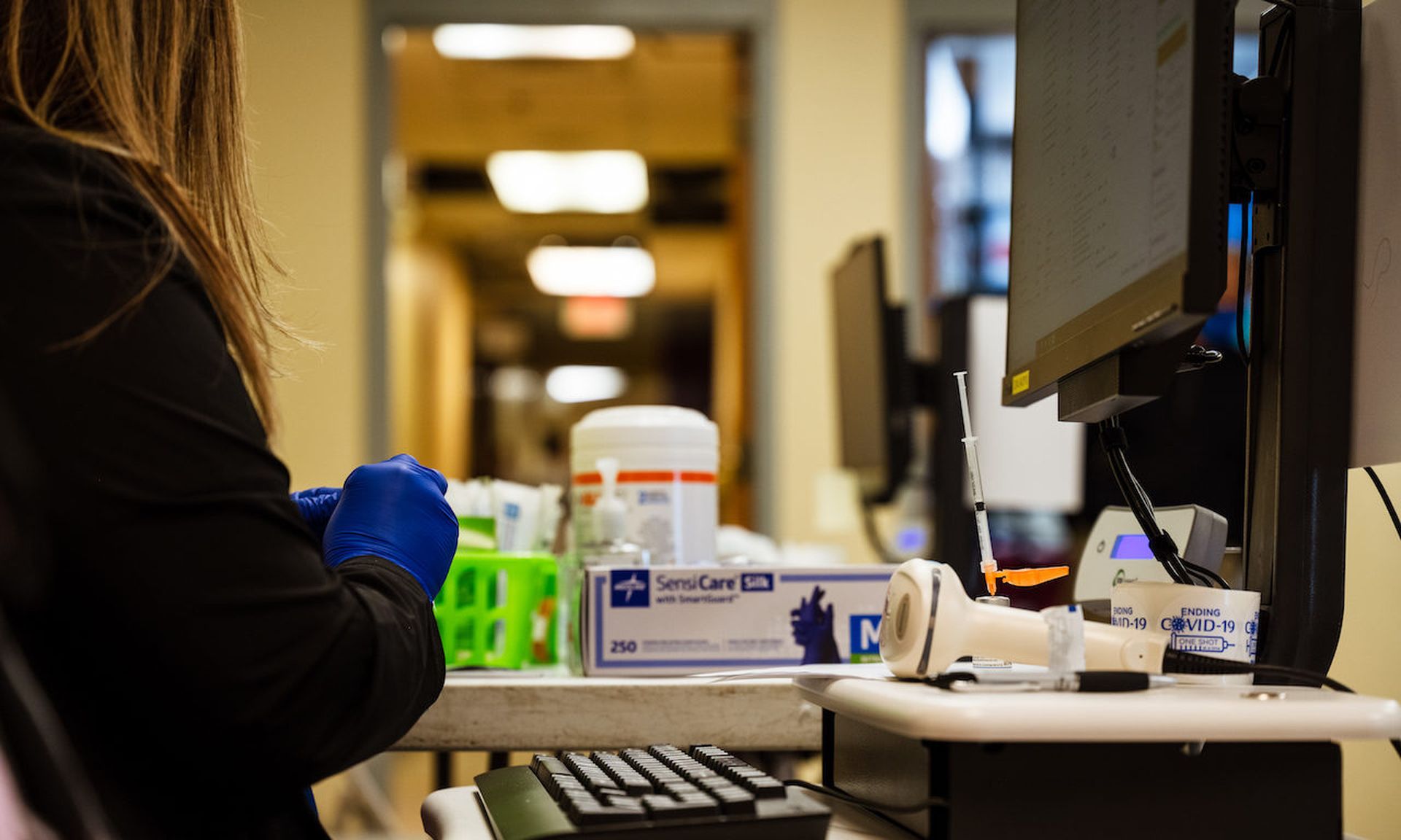 A medical technician in Bates Memorial Baptist Church in Louisville, Kentucky. ( Jon Cherry/Getty Images)