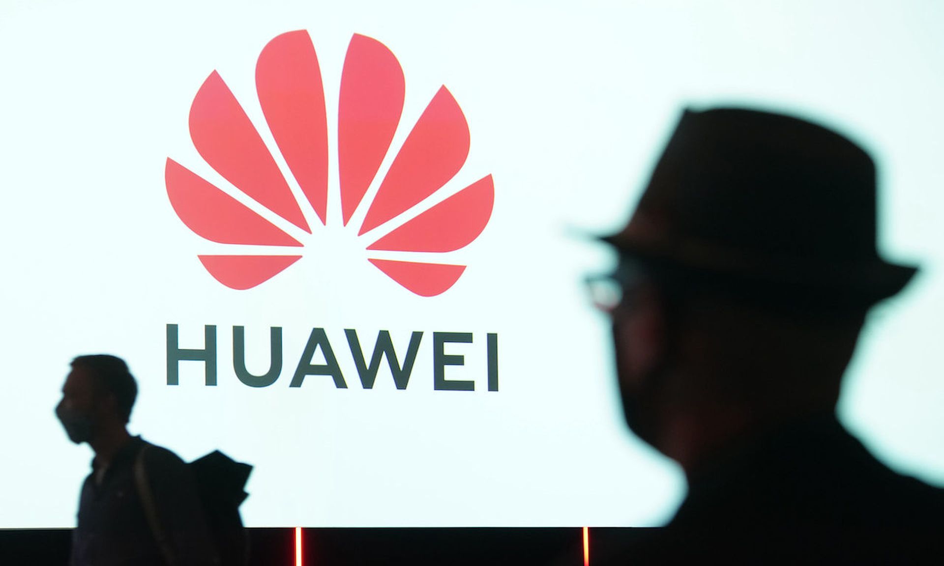 People arrive to attend the Huawei keynote address at the IFA 2020 Special Edition consumer electronics and appliances trade fair  in Berlin, Germany. Pointing to the security concerns tied to Huawei, as well as other recent incidents involving software vulnerabilities, the Telecommunications  Industry Association is preparing to release a new supp...