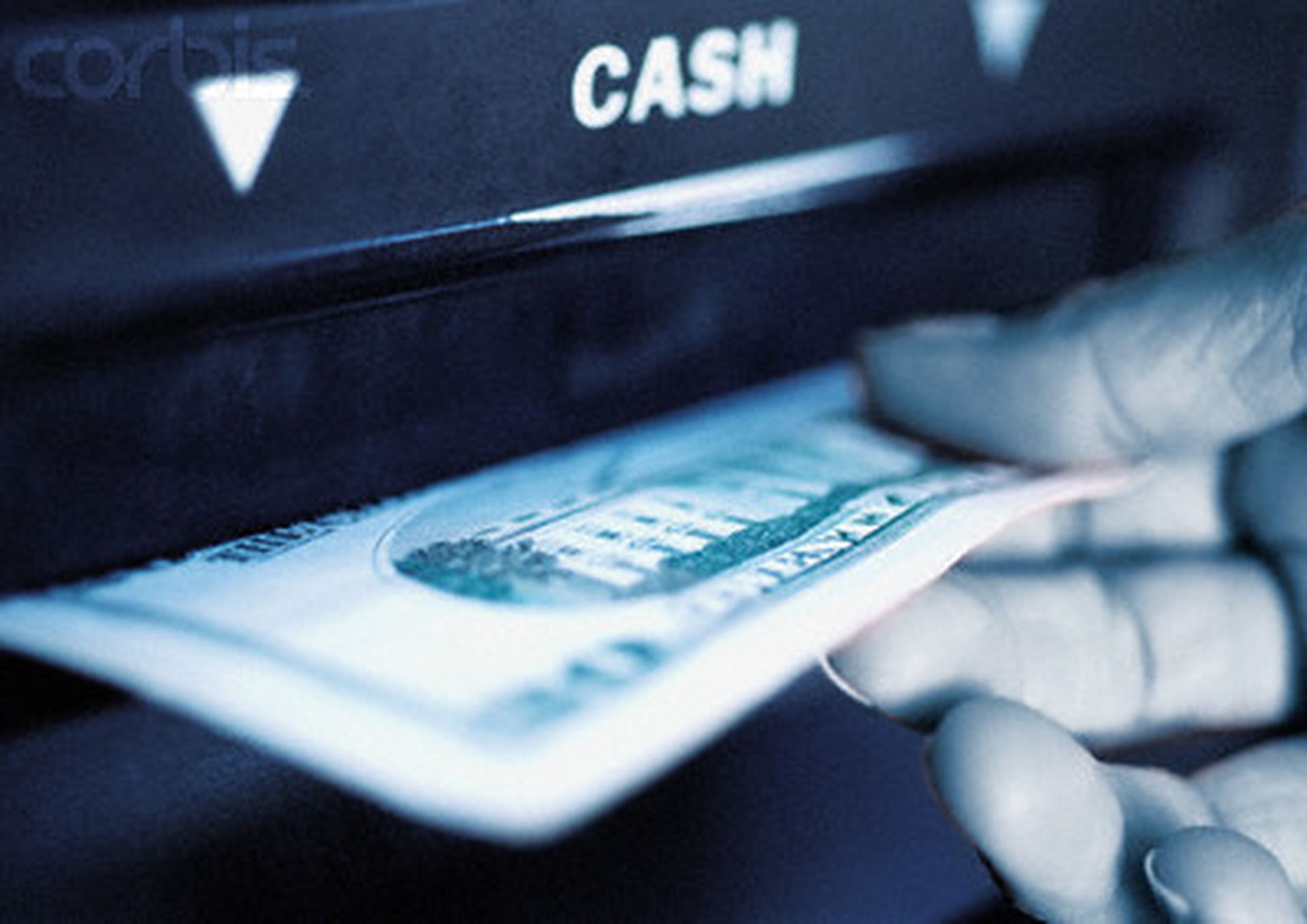2000 — Cash Withdrawal — Image by © image100/Corbis