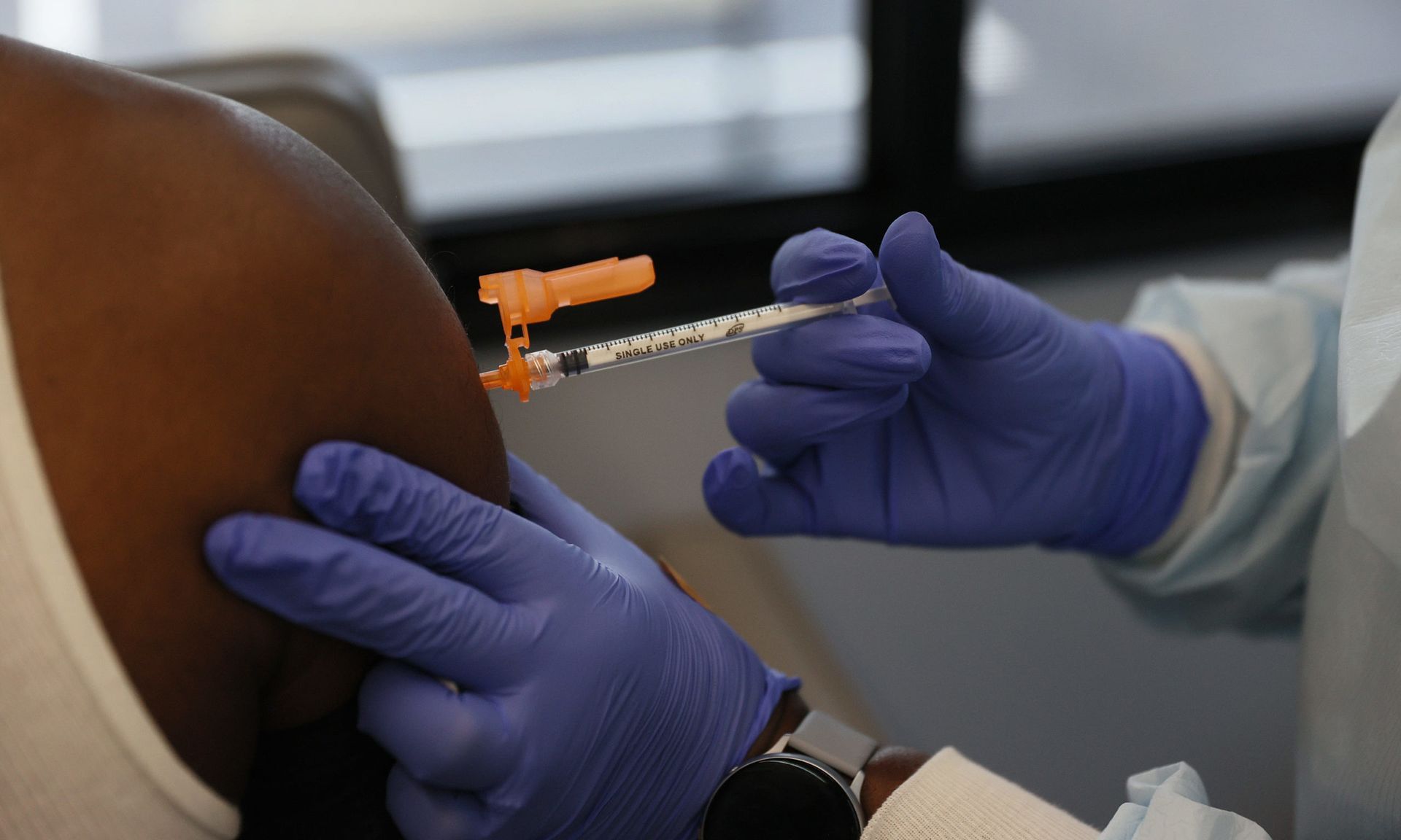 MIAMI, FLORIDA &#8211; MAY 17: Alex Telfort receives a Pfizer-BioNTech COVID-19 vaccine from Delores Fye, a licensed practical nurse, at the UHealth&#8217;s pediatric mobile clinic on May 17, 2021 in Miami, Florida. The University of Miami Health System&#8217;s pediatric mobile unit began distributing COVID-19 vaccines in Miami-Dade&#8217;s underse...