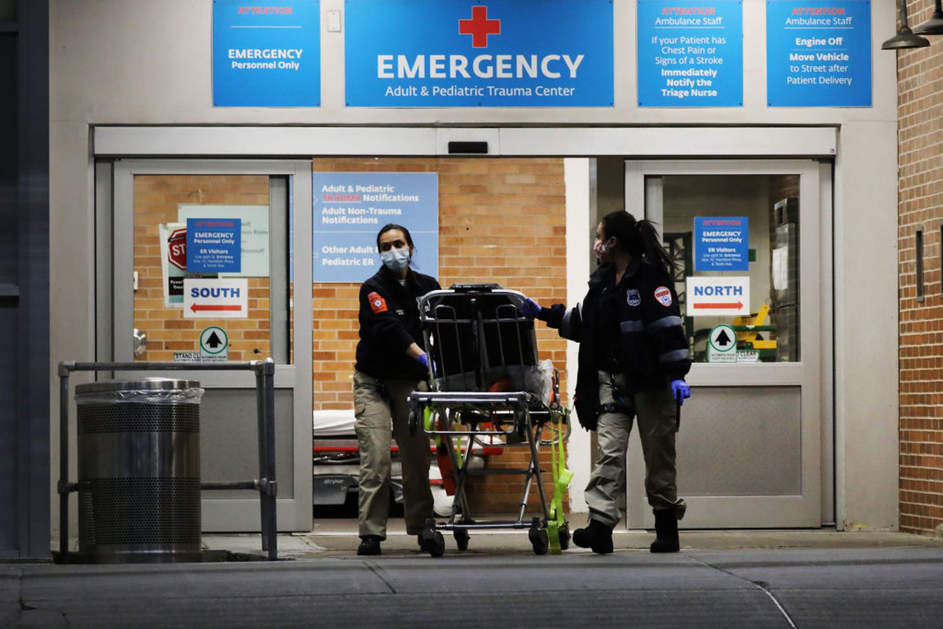 Medical workers walk outside a special coronavirus area at Maimonides Medical Center on May 26, 2020 in the Borough Park neighborhood of the Brooklyn borough of New York City. (Photo by Spencer Platt/Getty Images)