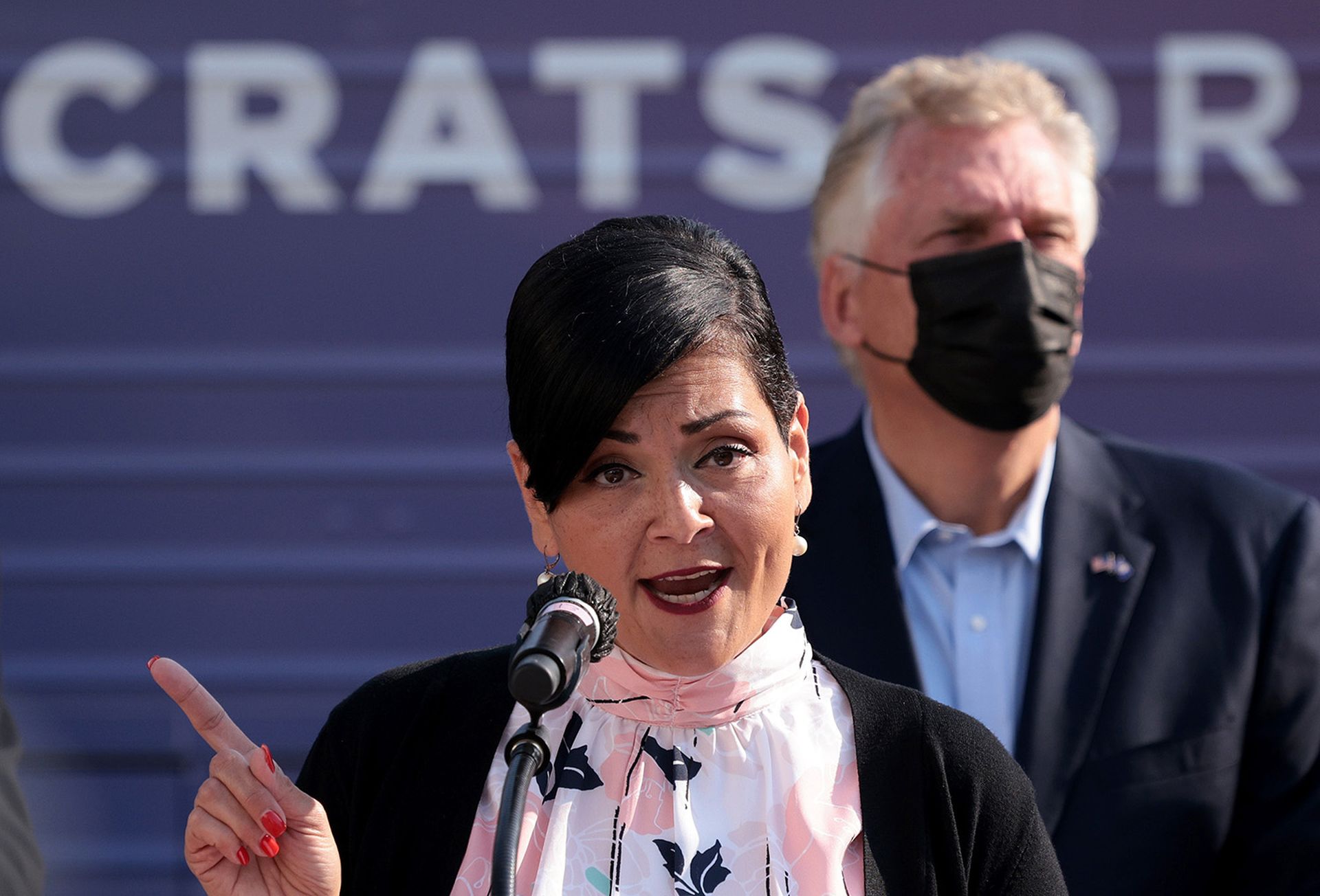 Virginia Delegate Hala Ayala, Democratic nominee in the 2021 Virginia lieutenant gubernatorial election, speaks during a campaign event for former Virginia Gov. Terry McAuliffe, right, at the Port City Brewing Company on Aug. 12, 2021, in Alexandria, Va. (Photo by Win McNamee/Getty Images)