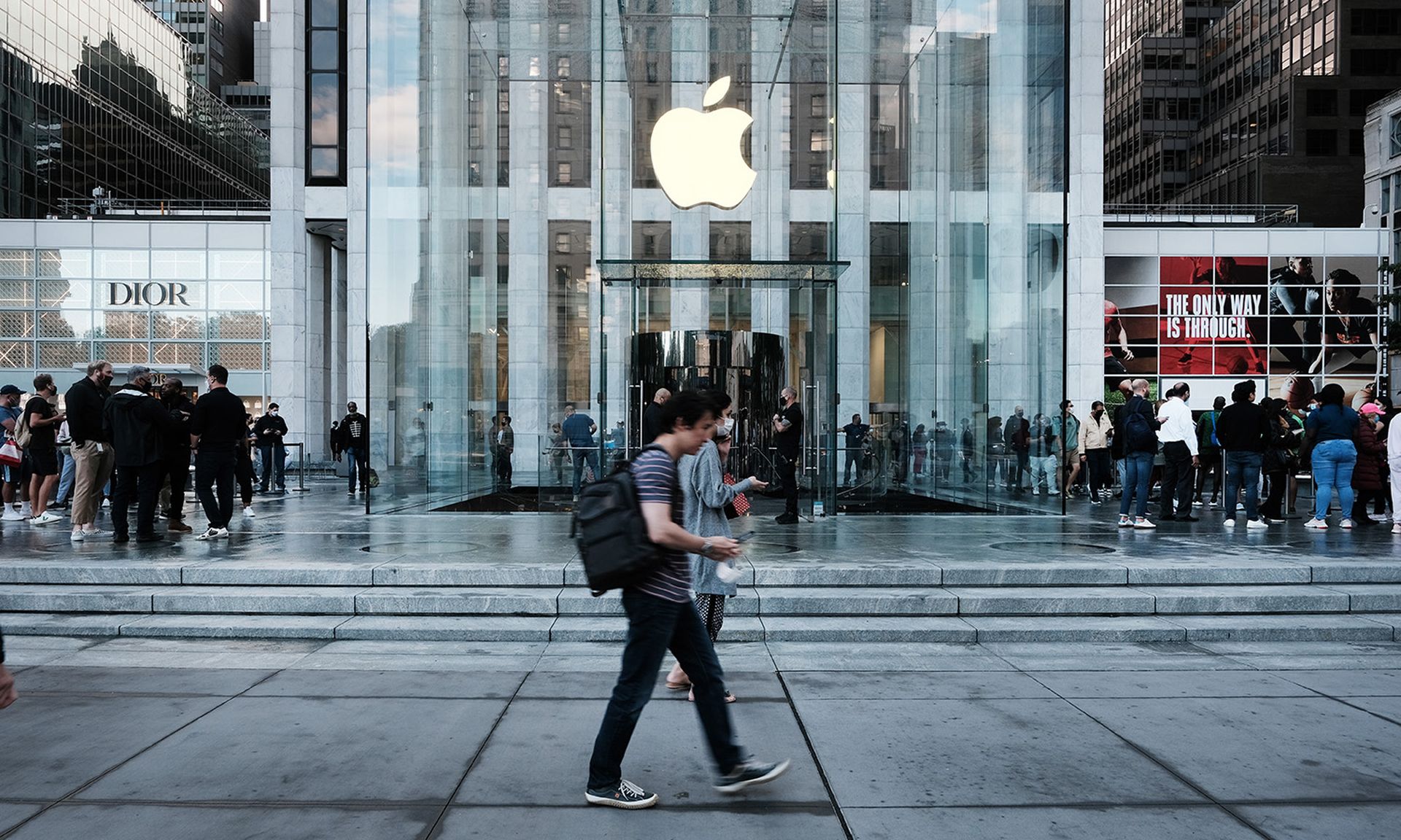 People shop at the Fifth Avenue Apple Store during the launch of Apple’s new iPhone 13 and iPhone 13 Mini on Sept. 24, 2021, in New York City. (Photo by Spencer Platt/Getty Images)