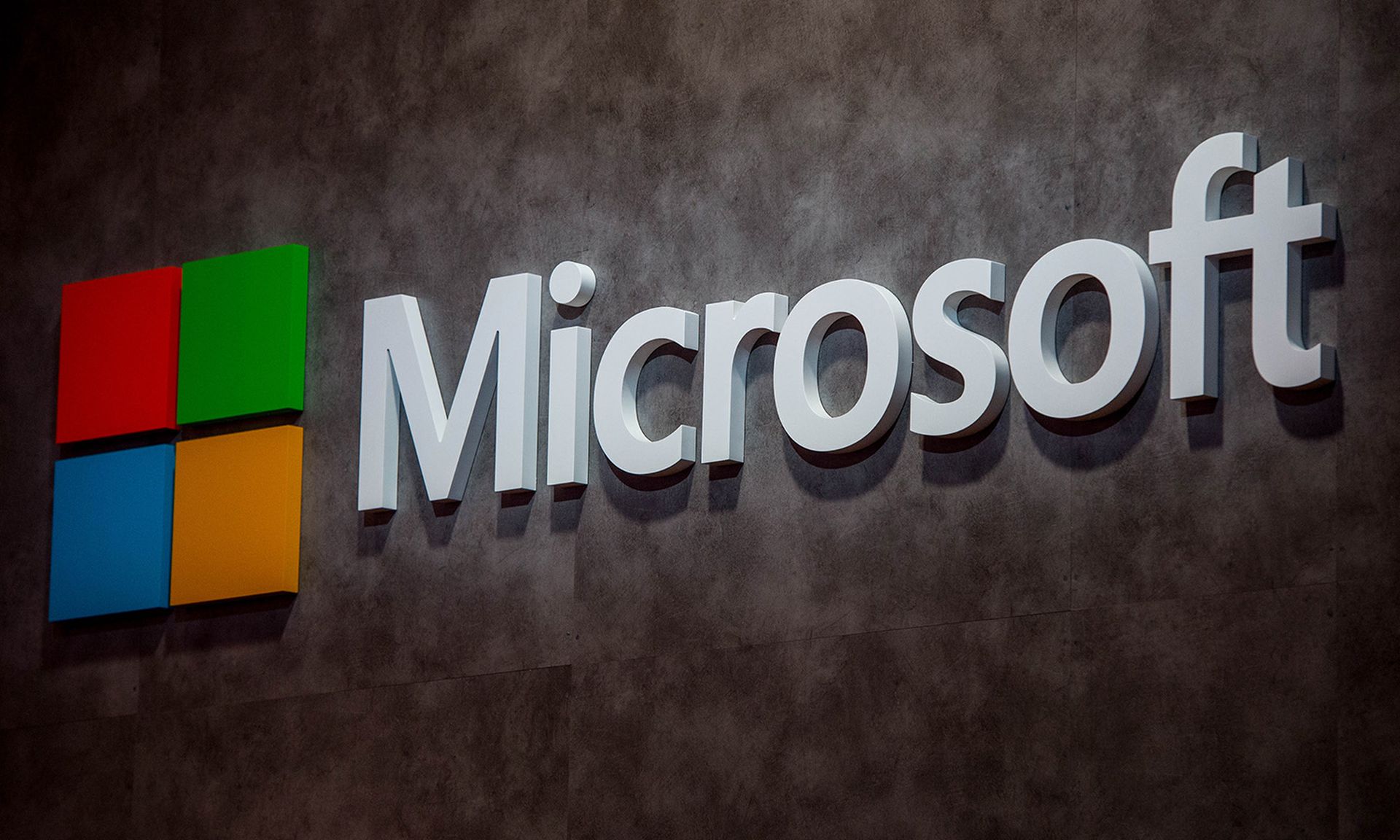 A logo sits illuminated outside the Microsoft pavilion on the opening day of the World Mobile Congress at the Fira Gran Via Complex on Feb. 22, 2016, in Barcelona, Spain. (Photo by David Ramos/Getty Images)