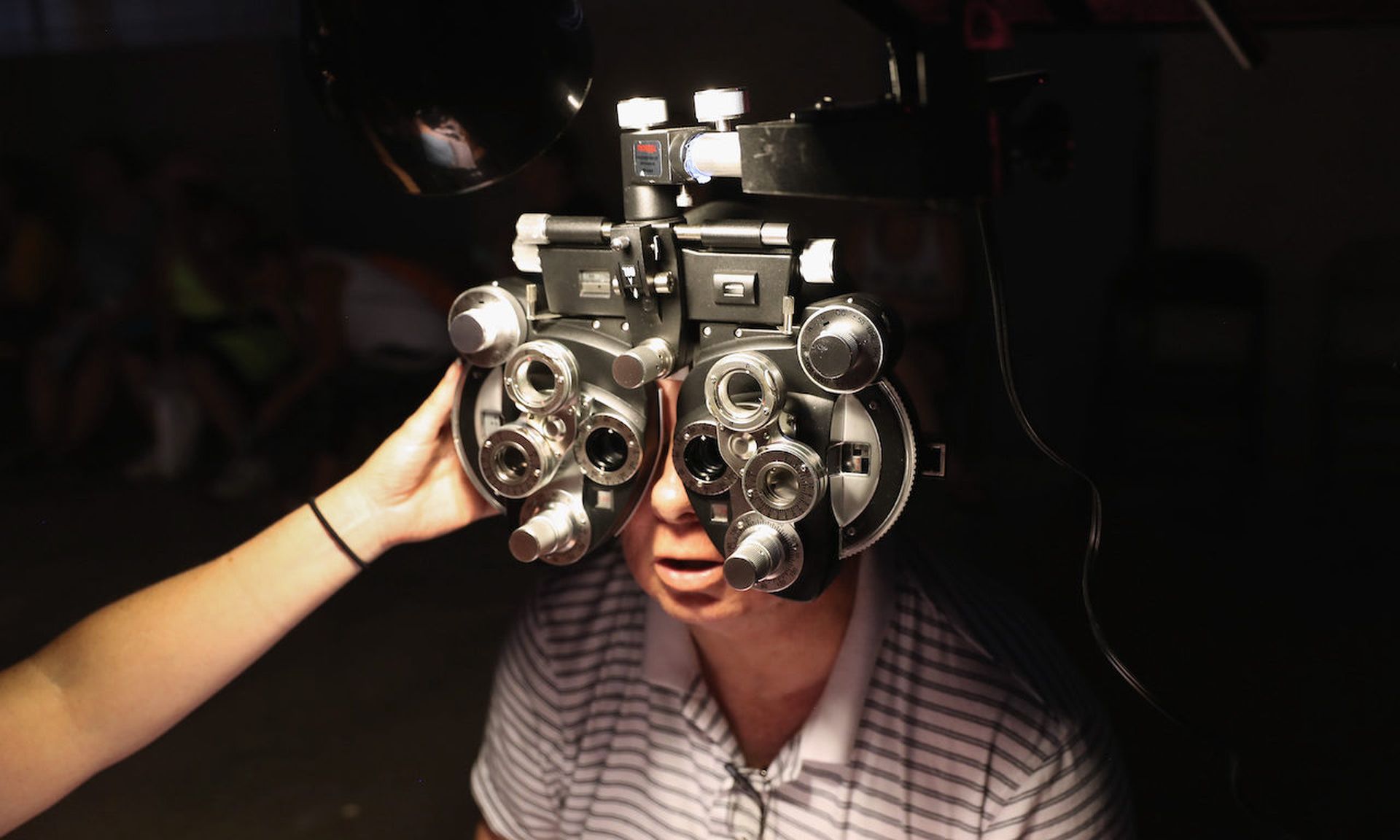 A patient receives an eye exam at a health clinic on July 22, 2017. (Photo by John Moore/Getty Images)