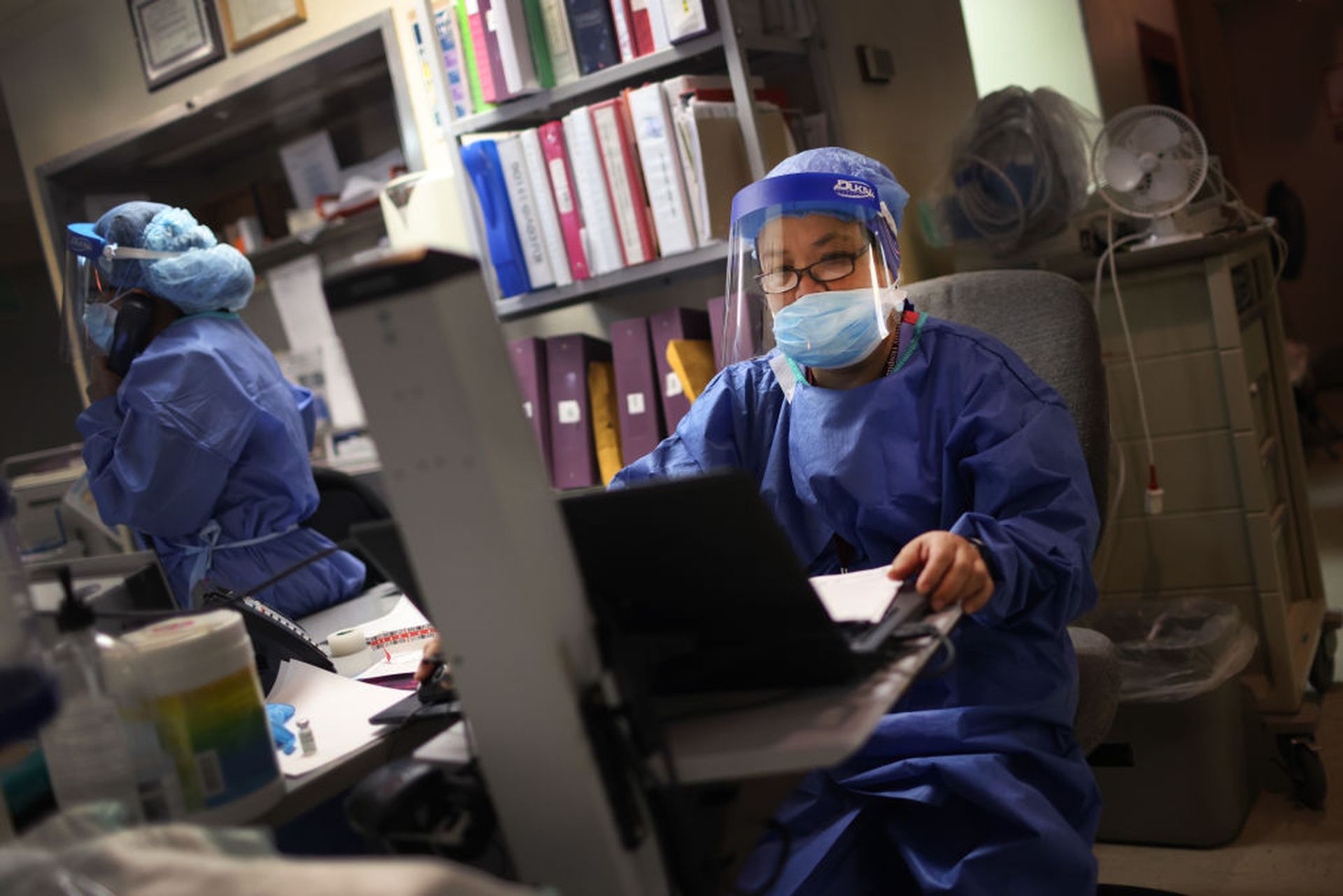 Intensive Care Unit nurse Alma Abad monitors patients in the ICU ward at Roseland Community Hospital on Dec. 14, 2020, in Chicago. (Photo by Scott Olson/Getty Images)