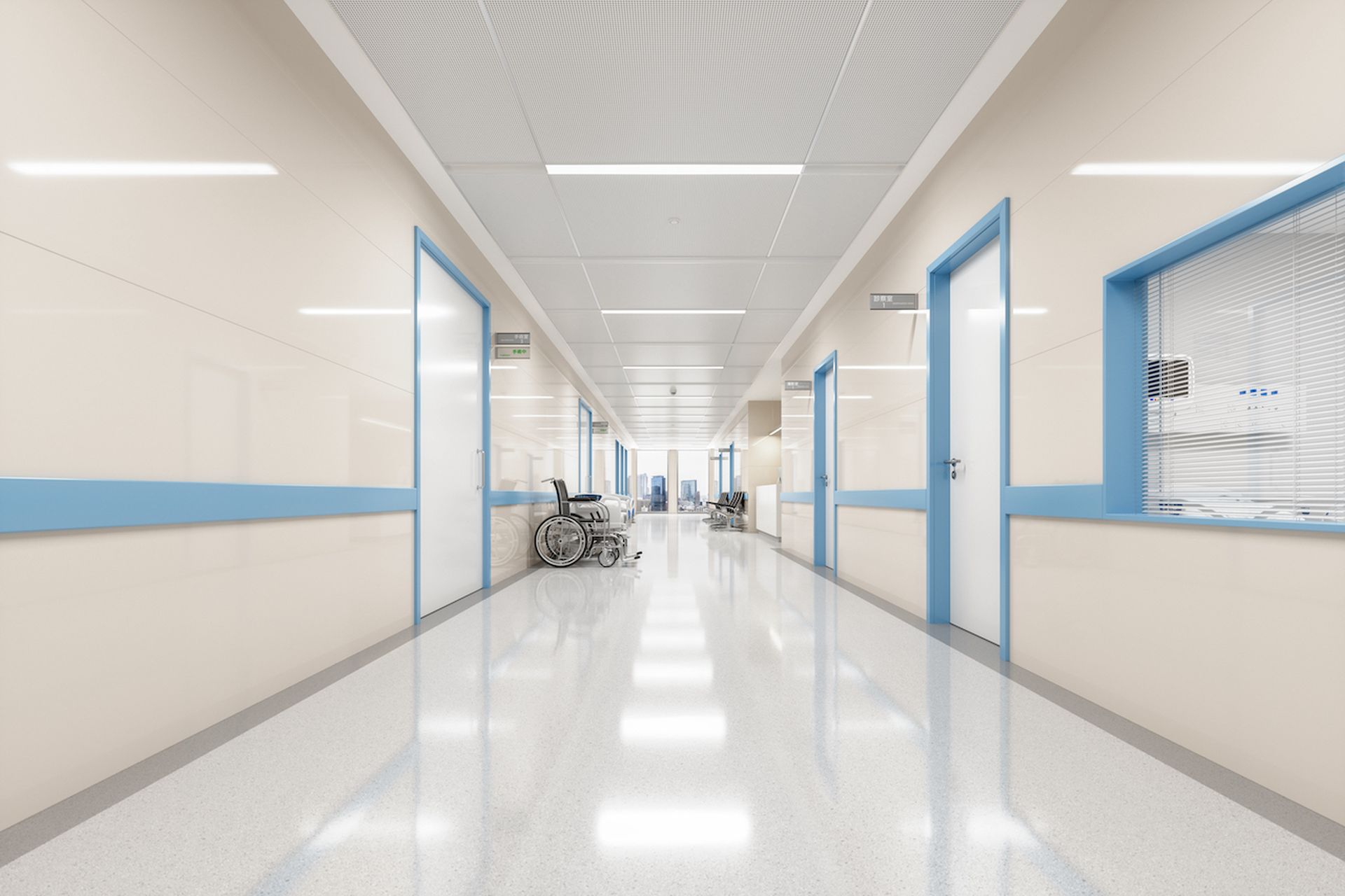 Corridor of an empty modern Japanese hospital with Japanese and English signages.