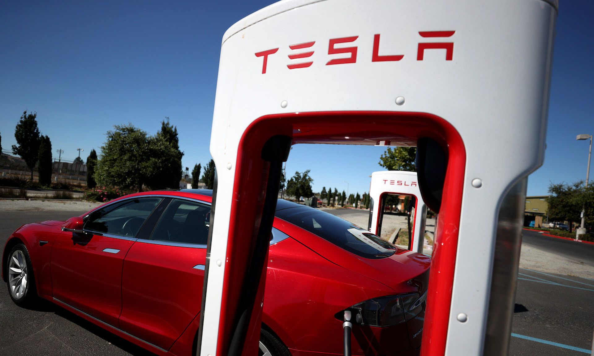 A Tesla car sits parked at a Tesla Supercharger on September 23, 2020 in Petaluma, Calif. Today’s columnist, Sascha Fahrbach of Fudo Security, says when it comes to insider threats, companies can’t depend on what happened at Tesla where an insider opted not take a $1 million bribe and ultimately worked with the FBI. Fahrbach lays out a five-point p...