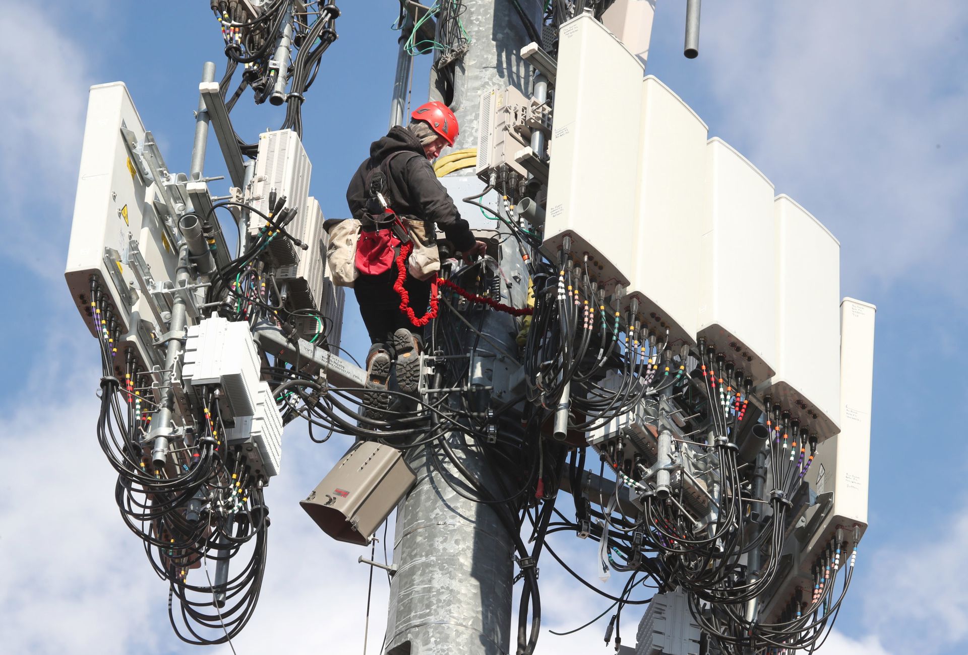 A worker rebuilds a cellular tower with 5G equipment for the Verizon network on November 26, 2019 in Orem, Utah. Based on Sandman&#8217;s tactics, techniques and procedures (TTPs), researchers suspect the group is likely espionage-focused and may be a private contractor or mercenary organization tasked with gathering the sensitive data telcos amas...