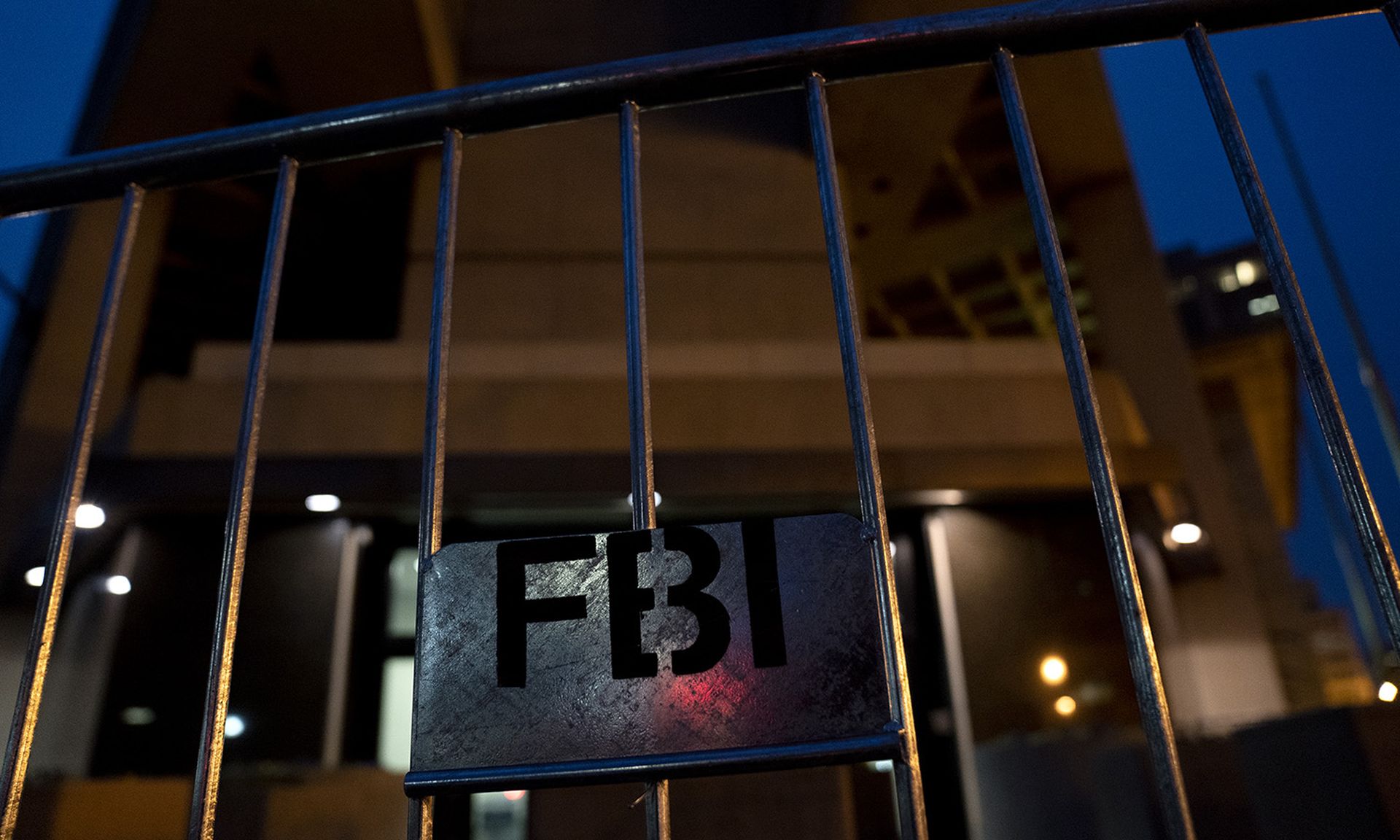 Police barricades stand in front of FBI headquarters on Jan. 11, 2021, in Washington. (Photo by Stefani Reynolds/Getty Images)