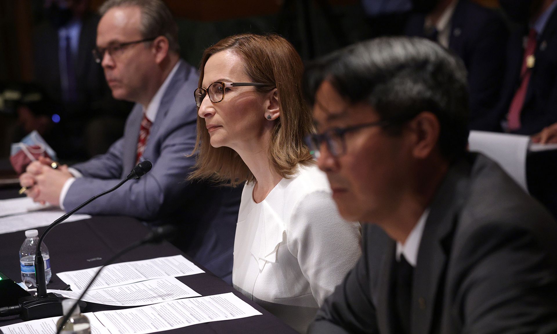 Left to right: Todd Harper, chairman of National Credit Union Administration; Jelena McWilliams, chairman of Federal Deposit Insurance Corporation;  and Acting Comptroller of the Currency Michael Hsu testify during a hearing before the Senate Banking, Housing and Urban Affairs Committee on Aug. 3, 2021, in Washington. (Photo by Alex Wong/Getty Imag...