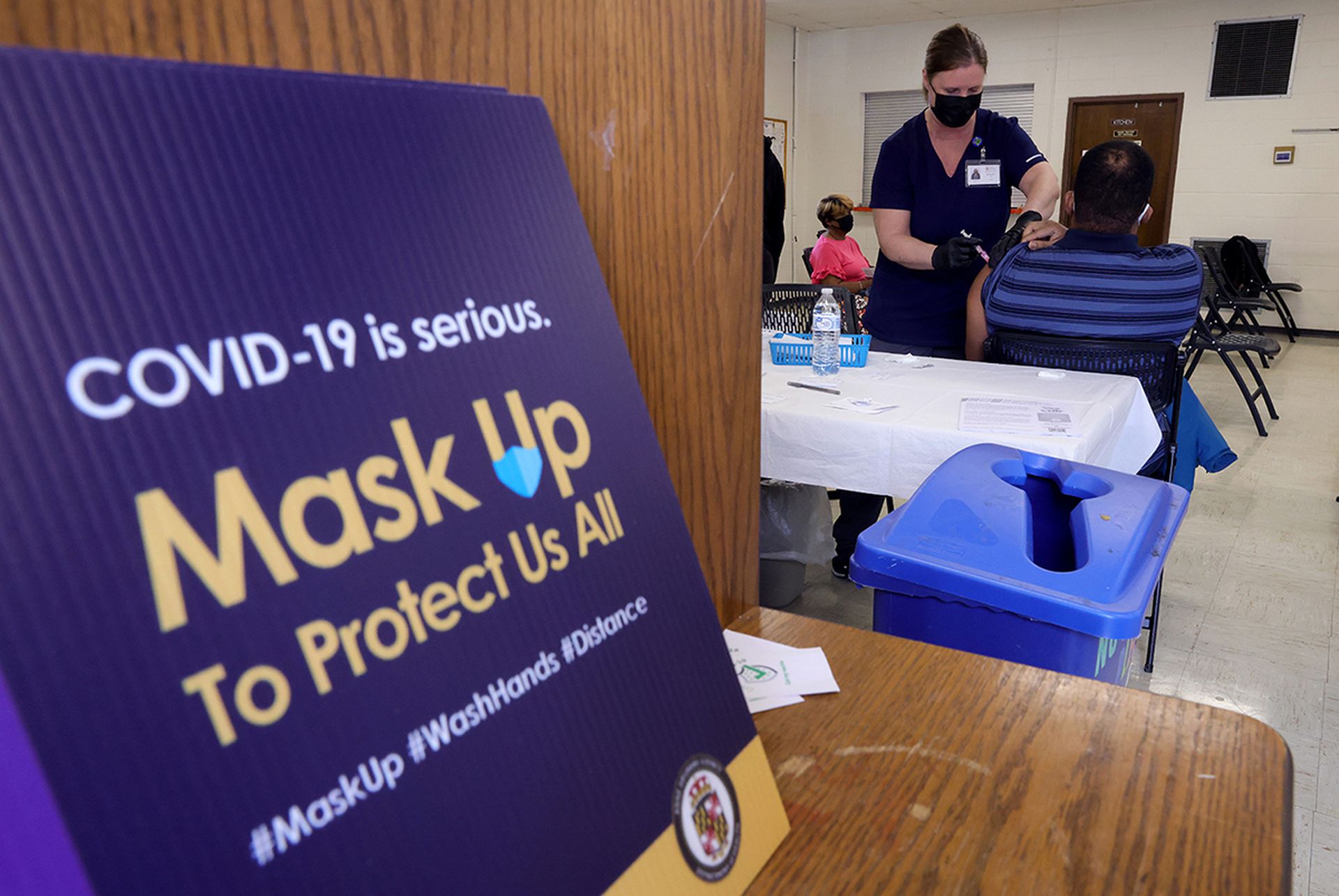 The Maryland Health Department is experiencing disruptions to its operations and COVID-19 reporting capacity. Pictured: Maryland residents receive the Moderna COVID-19 vaccine through the Anne Arundel County Department of Health at a community COVID-19 vaccination clinic at the Metropolitan United Methodist Church March 23, 2021, in Severn, Md. (Ph...