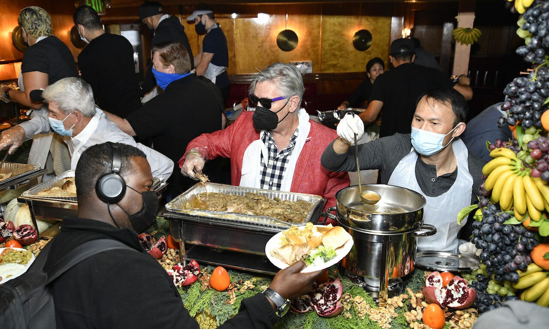 Comedians Tom Dreesen, Frazer Smith and Thom Tran serve food at the 41st free Thanksgiving dinner at The Laugh Factory on November 25, 2021 in West Hollywood, Calif. Today&#8217;s columnist, Josh Yavor of Tessian, says too many security team members are pressured into missing important family holidays, a situation that CISOs need to get proactive a...