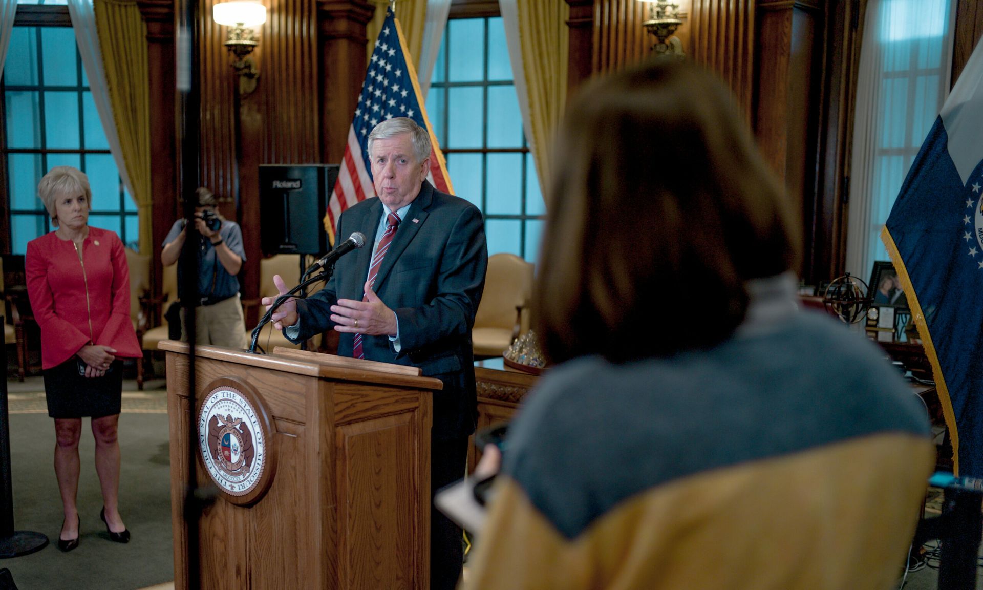 Missouri Gov. Mike Parson responds to a  question from a different reporter in 2019.  (Photo by Jacob Moscovitch/Getty Images)