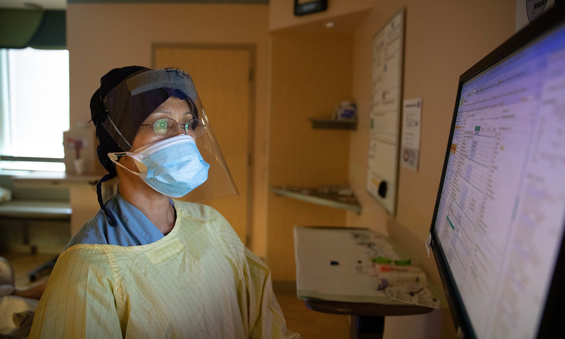 Healthcare groups are urging regulators to address patient privacy posed by third-party apps. Pictured: Army Reserve Maj. Francy Legayada inputs her patient’s vitals into the hospital computer system, Jan. 19, 2021, at the Yuma Regional Medical Center in Yuma, Ariz. (Staff Sgt. Cambrin Bassett/Army)