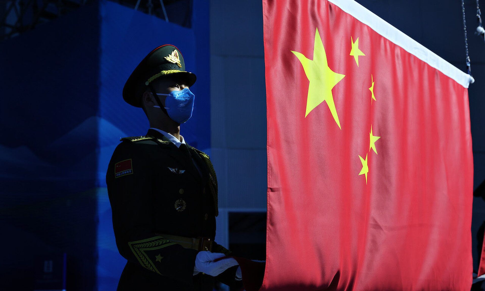 The Chinese flag is raised in Yanqing, China. (Photo by Alexander Hassenstein/Getty Images)