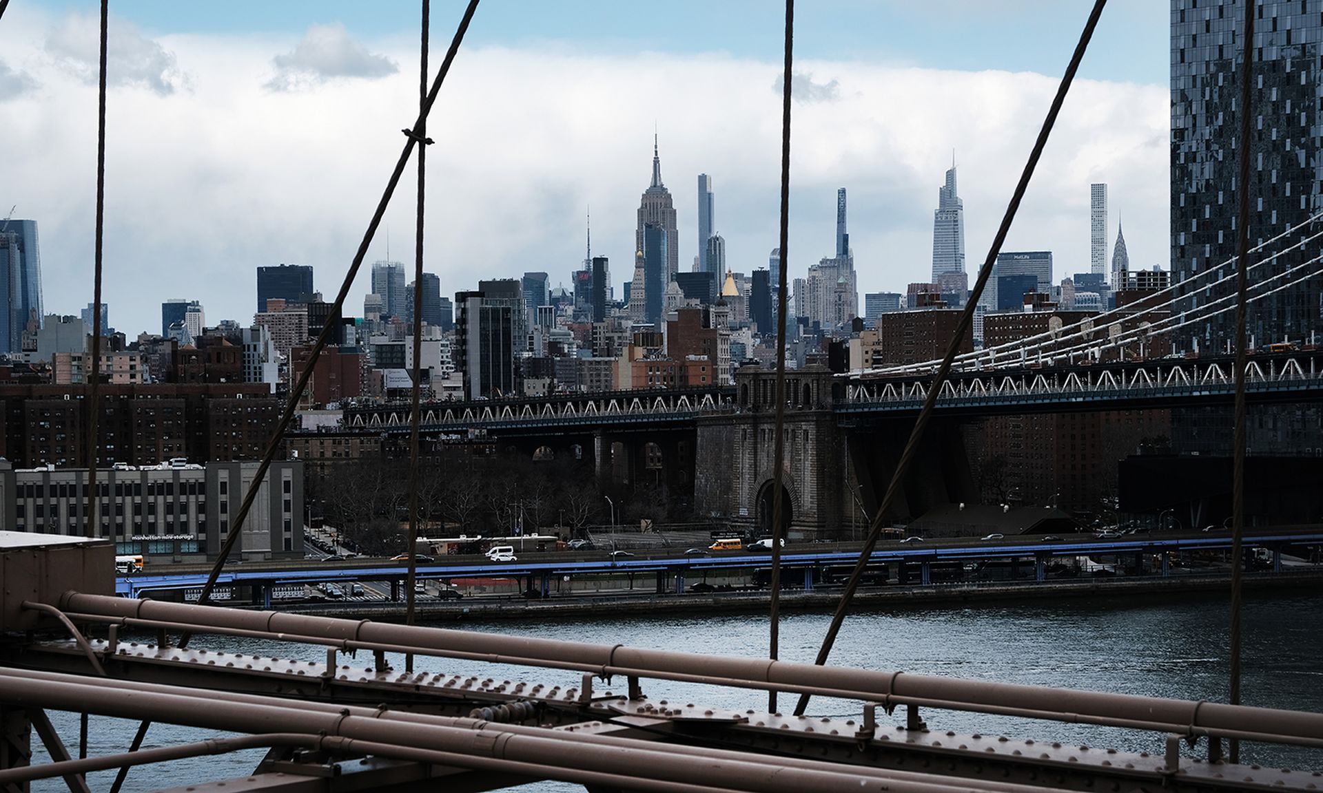 Metro areas such as New York City are the most active for attacks from bad actors, according to a new report by LookingGlass. Pictured: The Manhattan skyline looms over the East River on March 28, 2022, in New York City. (Photo by Spencer Platt/Getty Images)