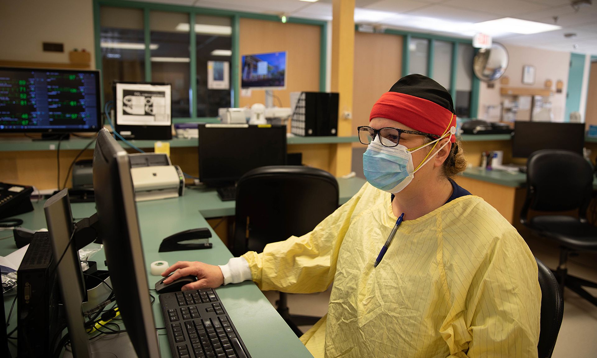 Agencies are assessing how to bridge the IT, OT, physical and cyber security gaps during a healthcare incident, said government leaders at CyberMed. Pictured: Army Reserve Capt. Tammy Heredia inputs patient vitals into the hospital computer system at Yuma Regional Medical Center in Arizona on Jan. 21, 2021. (Staff Sgt. Cambrin Bassett/Army)