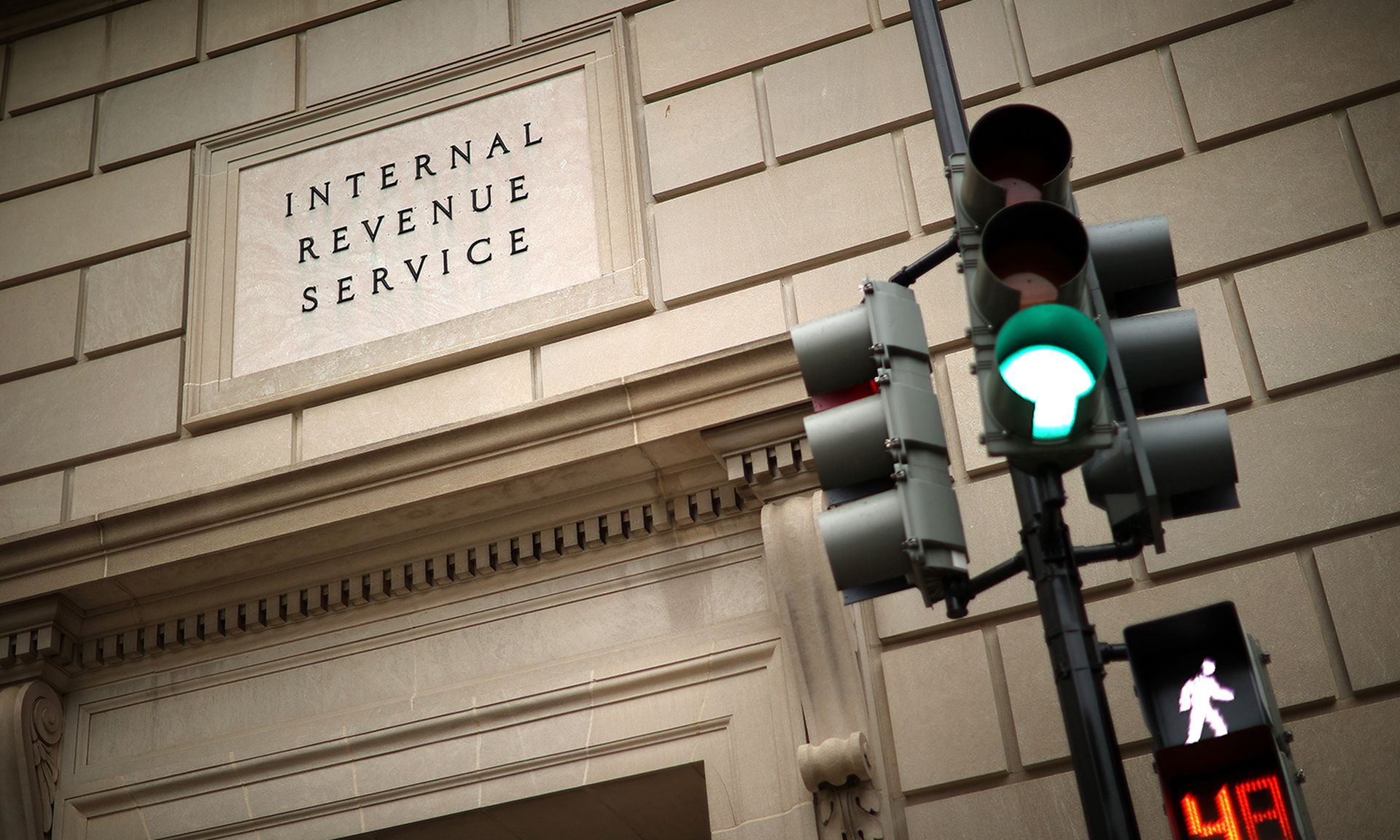 The Internal Revenue Service headquarters building appeared to be mostly empty April 27, 2020, in the Federal Triangle section of Washington. (Photo by Chip Somodevilla/Getty Images)