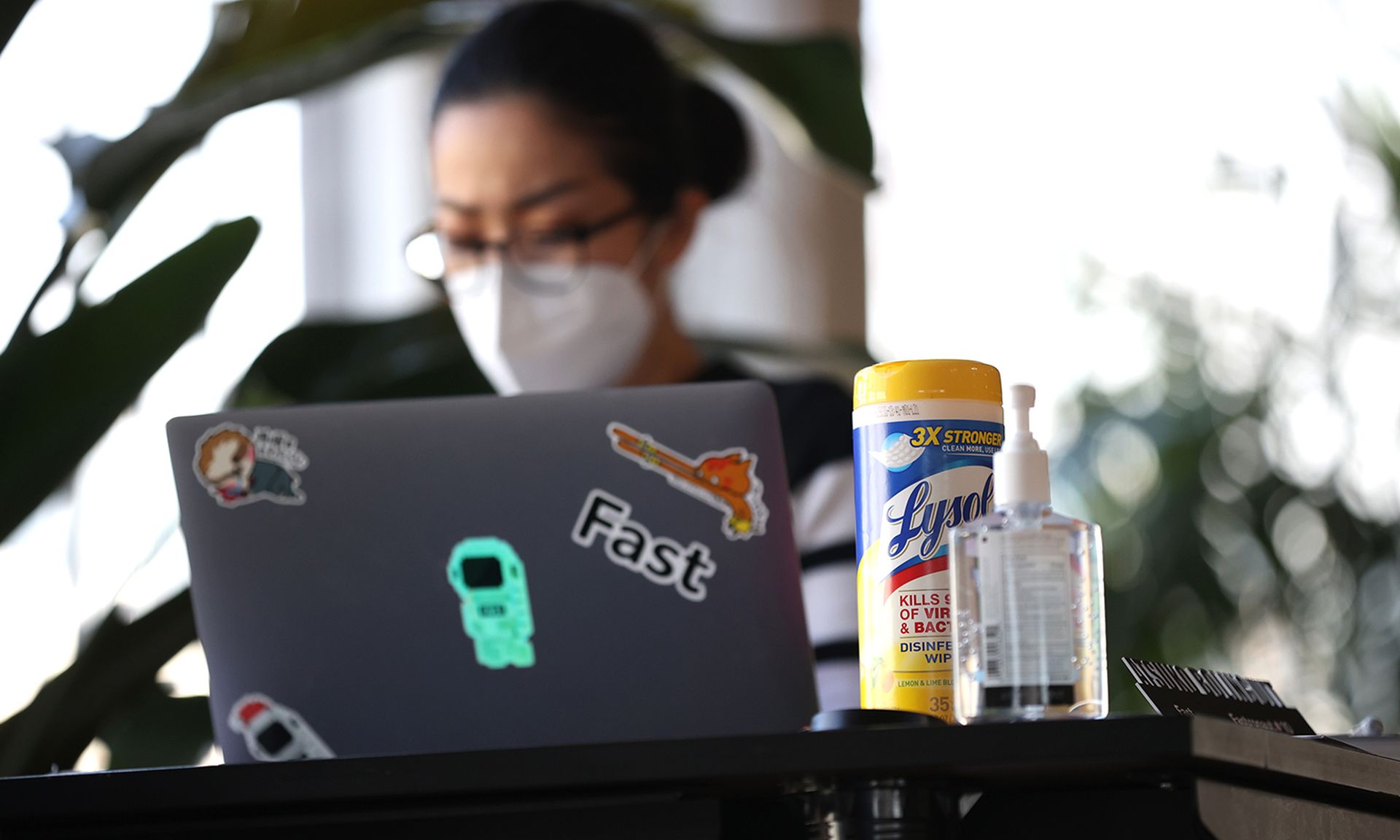 An employee with a tech startup company works on the first day back in the office on March 24, 2021, in San Francisco. (Photo by Justin Sullivan/Getty Images)