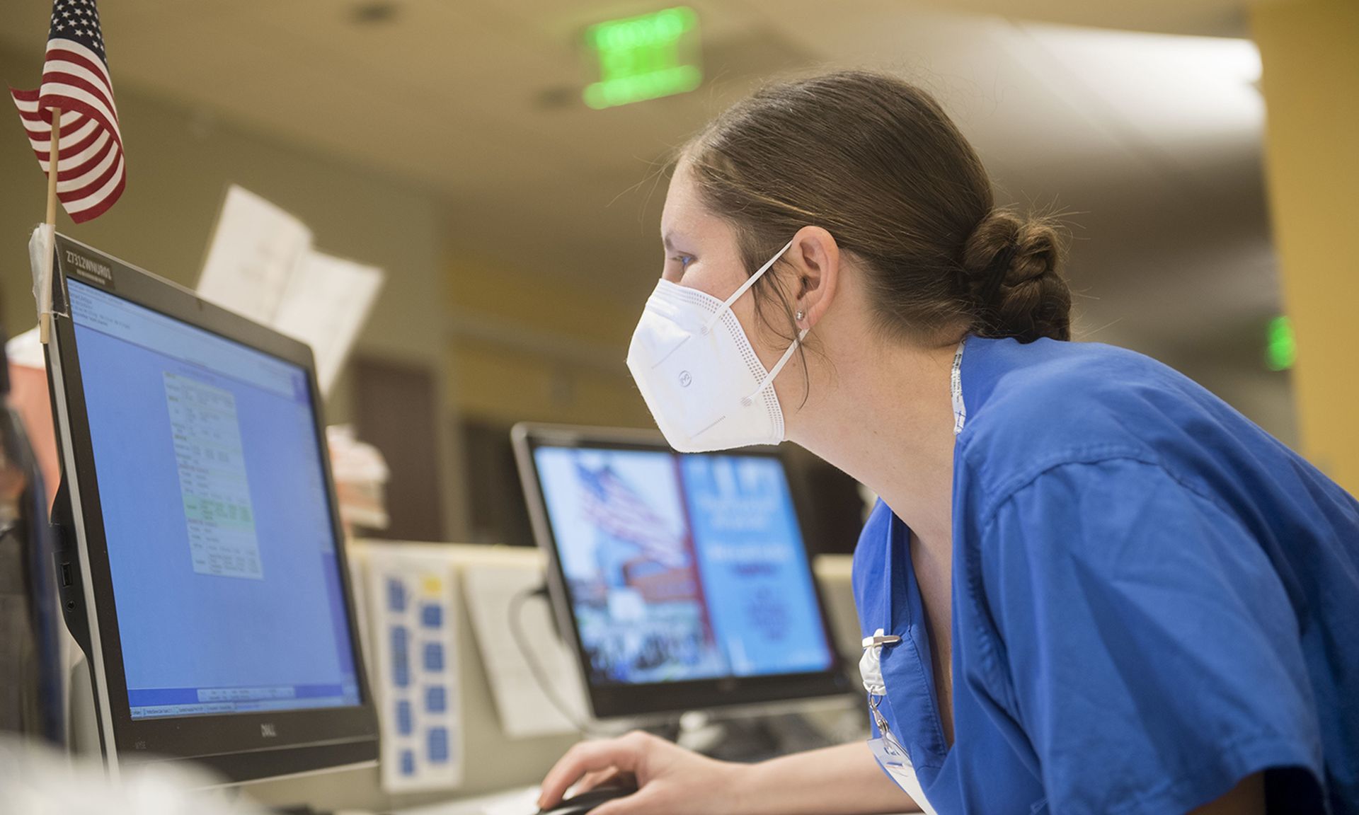 An Air Force emergency trauma nurse enters information into a computer at Stamford Hospital-Bennett Medical Center, Stamford, Conn., May 14, 2020. (Senior Airman Nicholas Dutton/Air Force)