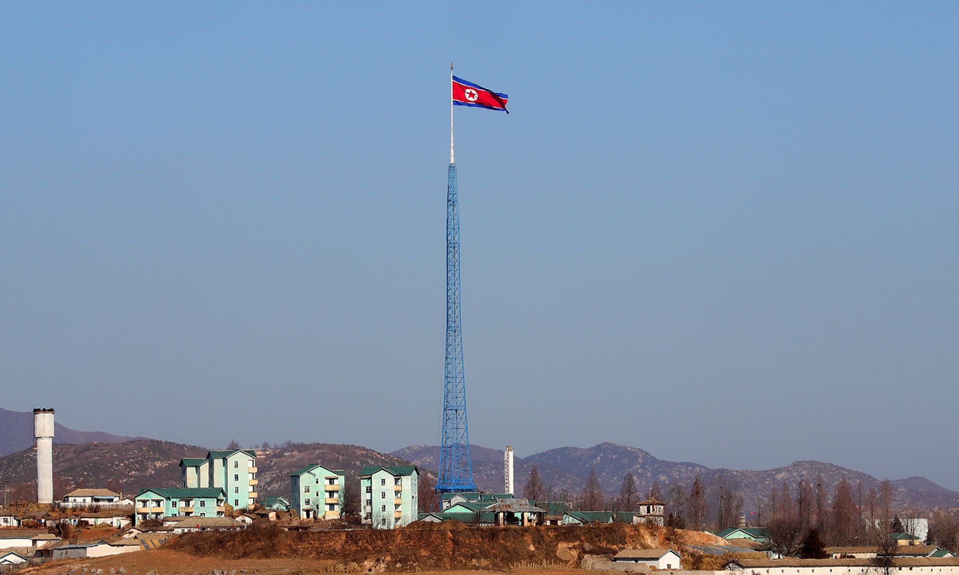A national flag flies in North Korea’s propaganda village of Gijungdong on Dec. 26, 2018, in Kaesong, North Korea. (Photo by Korea Pool/Getty Images)