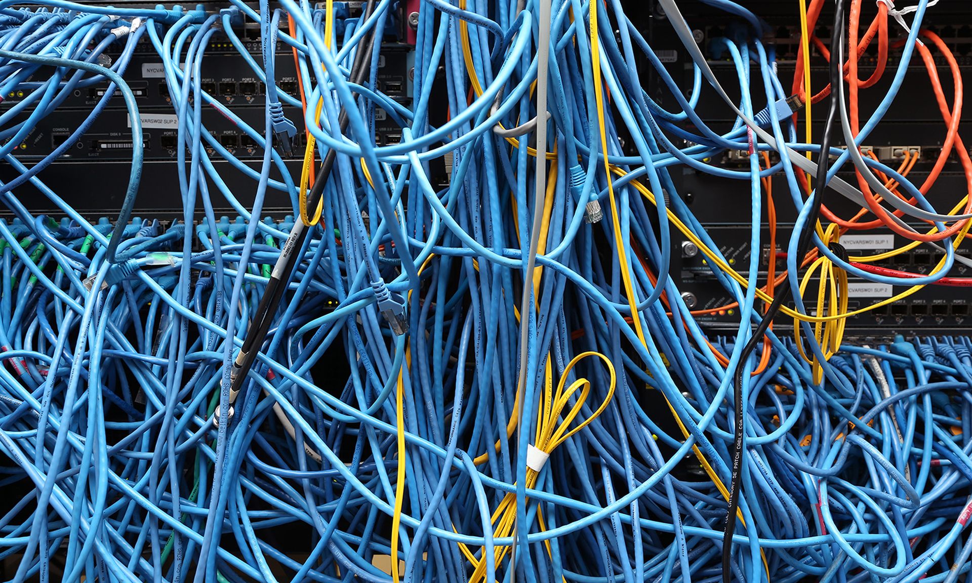 Network cables are plugged in a server room on Nov. 10, 2014, in New York City. (Photo by Michael Bocchieri/Getty Images)