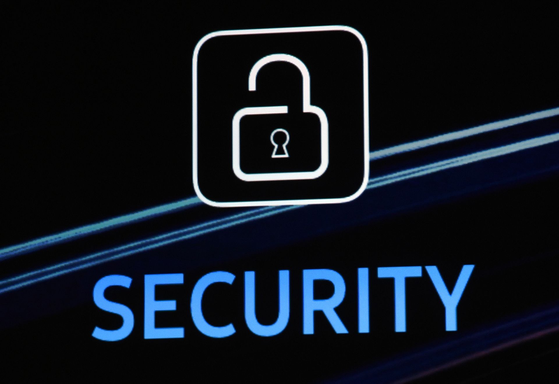 A security logo is shown on screen during a keynote address at CES 2016 on Jan. 7, 2016, in Las Vegas. (Photo by Ethan Miller/Getty Images)