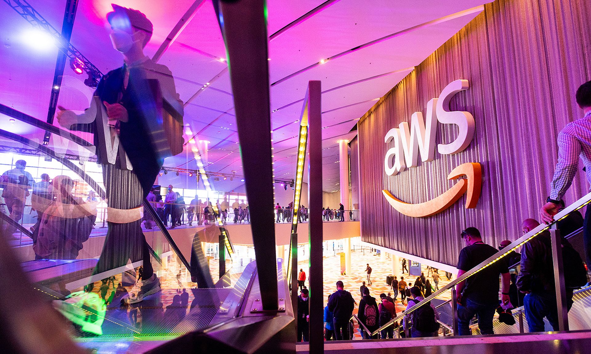 Trend Micro achieved AWS Healthcare Competency statues, the company announced Thursday. Pictured: Attendees arrive during AWS re:Invent 2021, a conference hosted by Amazon Web Services, on Nov. 30, 2021, in Las Vegas. (Photo by Noah Berger/Getty Images for Amazon Web Services)