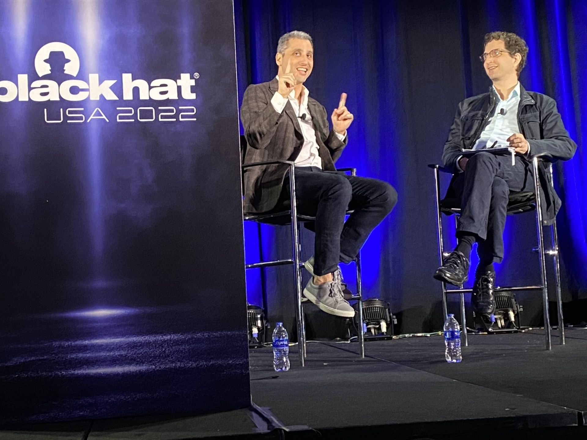 Rob Silvers, left, undersecretary of Homeland Security for strategy, policy and plans, speaks with Black Hat founder Jeff Moss, right, about the Cyber Safety Review Board. Silvers said the board&#8217;s initial investigation into Log4j proved its value. (Photo Credit: Derek B. Johnson/SC Media)