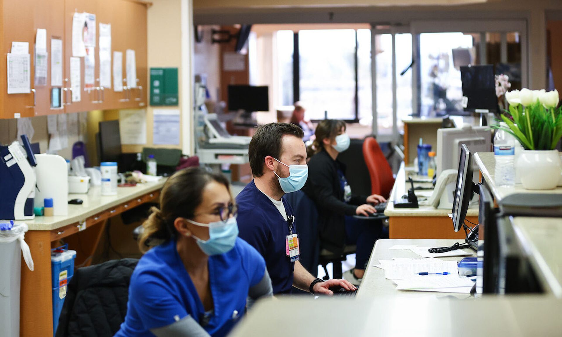 Registered nurses work in the ICU at Providence St. Mary Medical Center on March 11, 2022 in Apple Valley, Calif. Today’s columnist, Damian Chung of Netskope, writes how healthcare environments need good young cybersecurity talent. (Photo by Mario Tama/Getty Images)