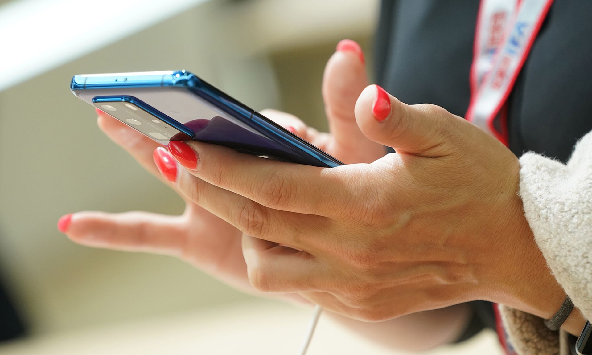 A visitor tries out a smartphone