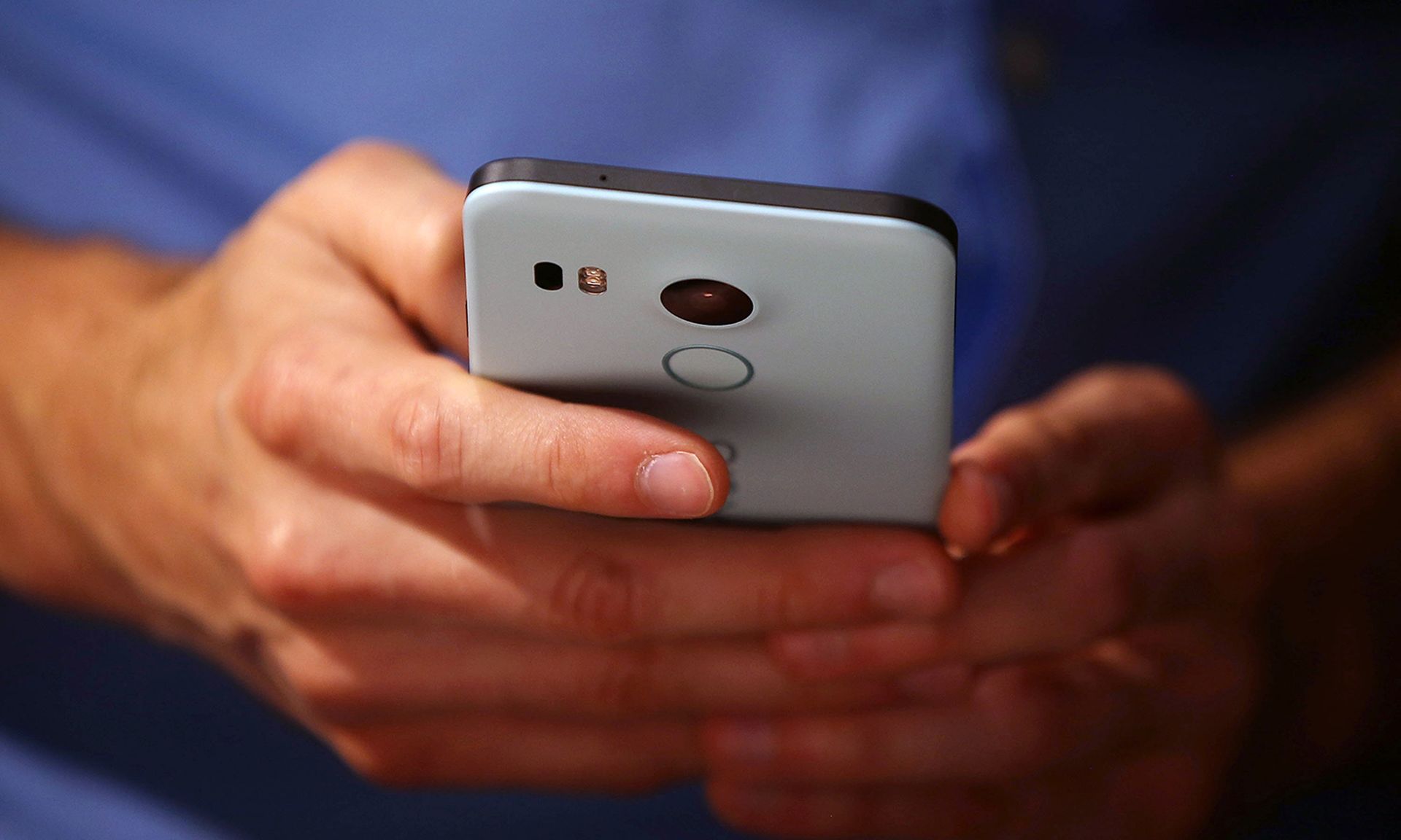 A person uses a smartphone