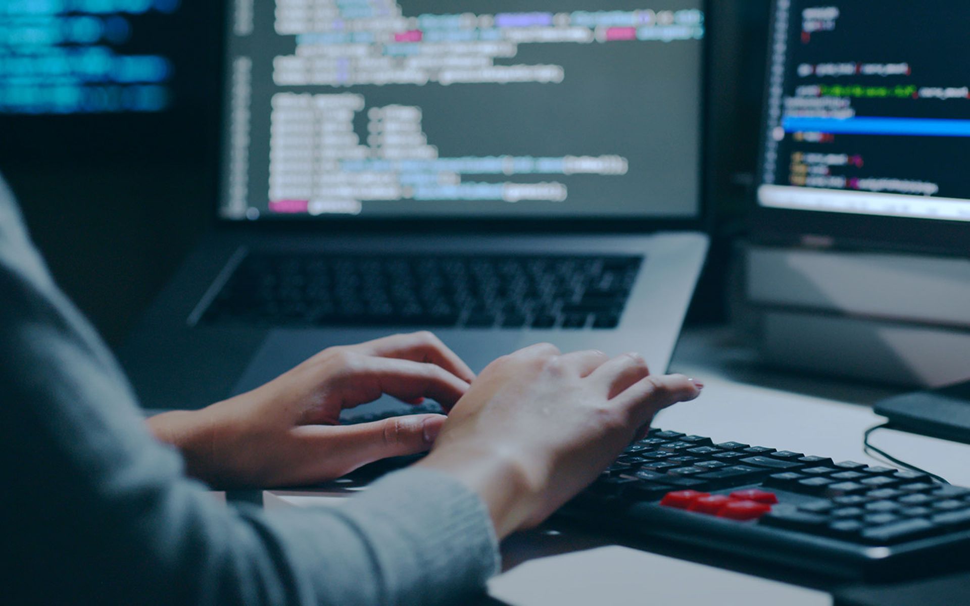 Closeup hand of developer programmer, software engineer, IT support, typing on computer keyboard