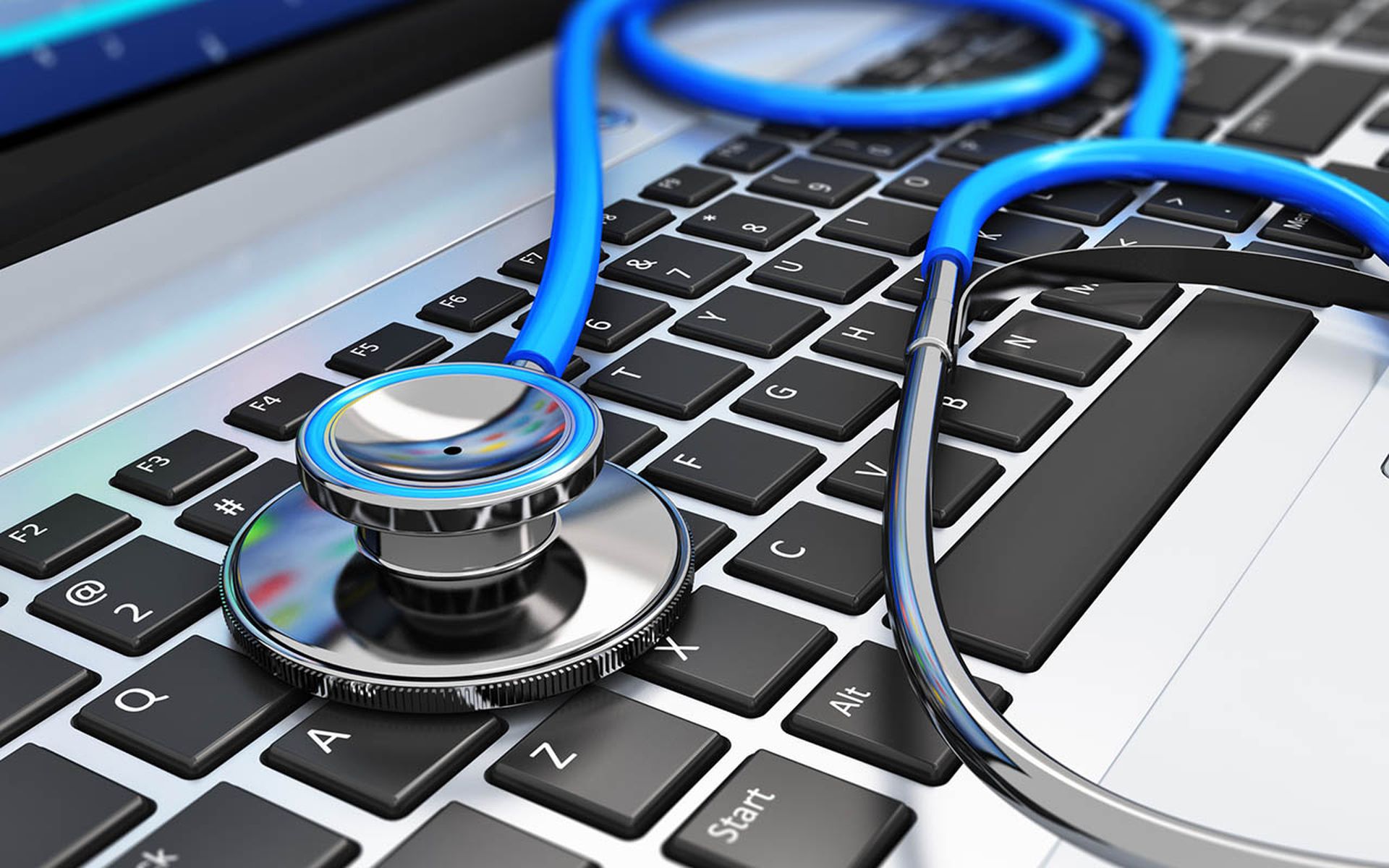 Stethoscope on laptop keyboard