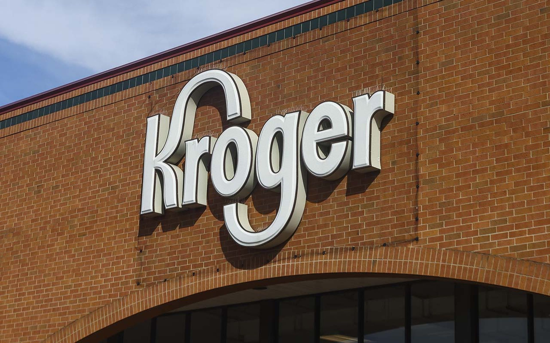 The Kroger logo is displayed on a storefront.