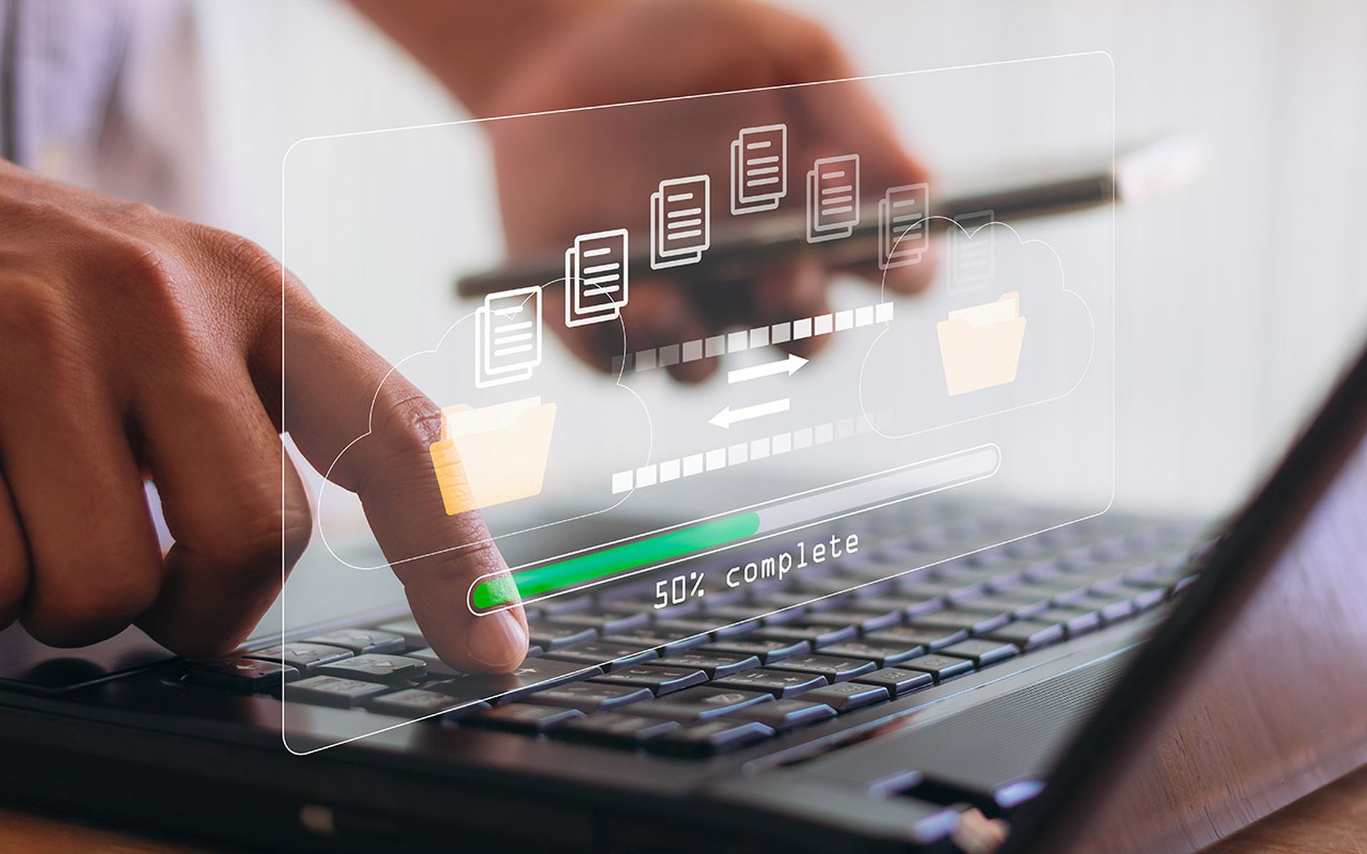 Transfer files data system relocation with internet cloud technology concept. Person hand using laptop computer waiting for transfer file process with loading bar icon on virtual screen.