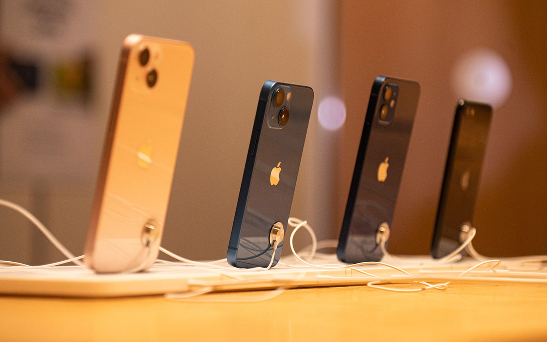 Apple iPhones at an Apple Store.